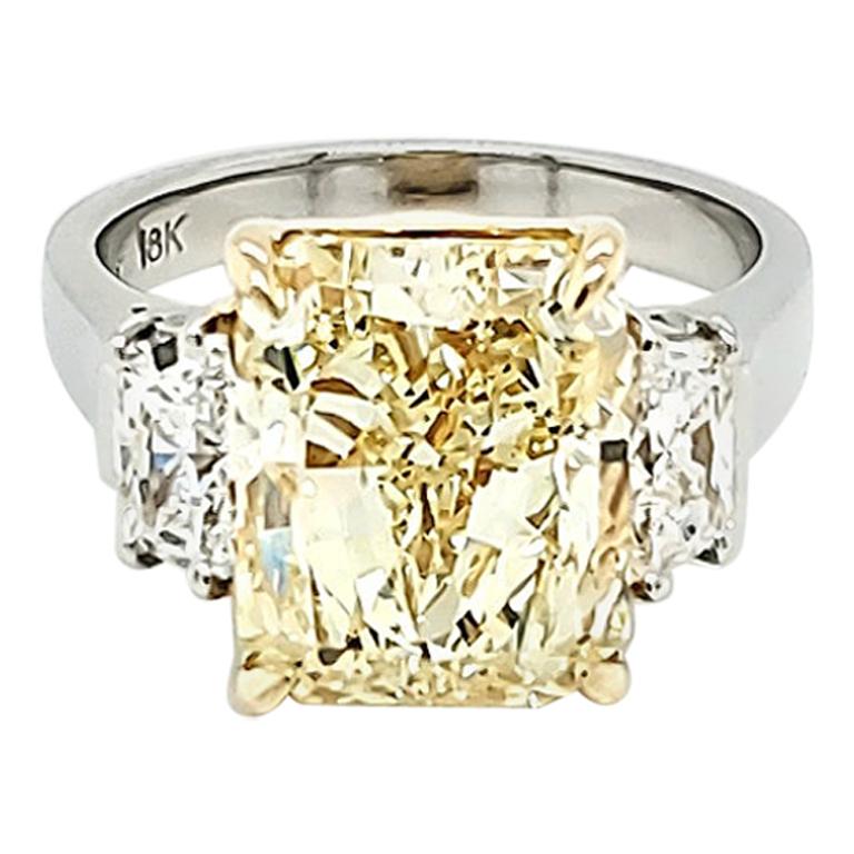GIA Certified 6.02 Carat Fancy Yellow Radiant Cut Diamond Three-Stone Ring