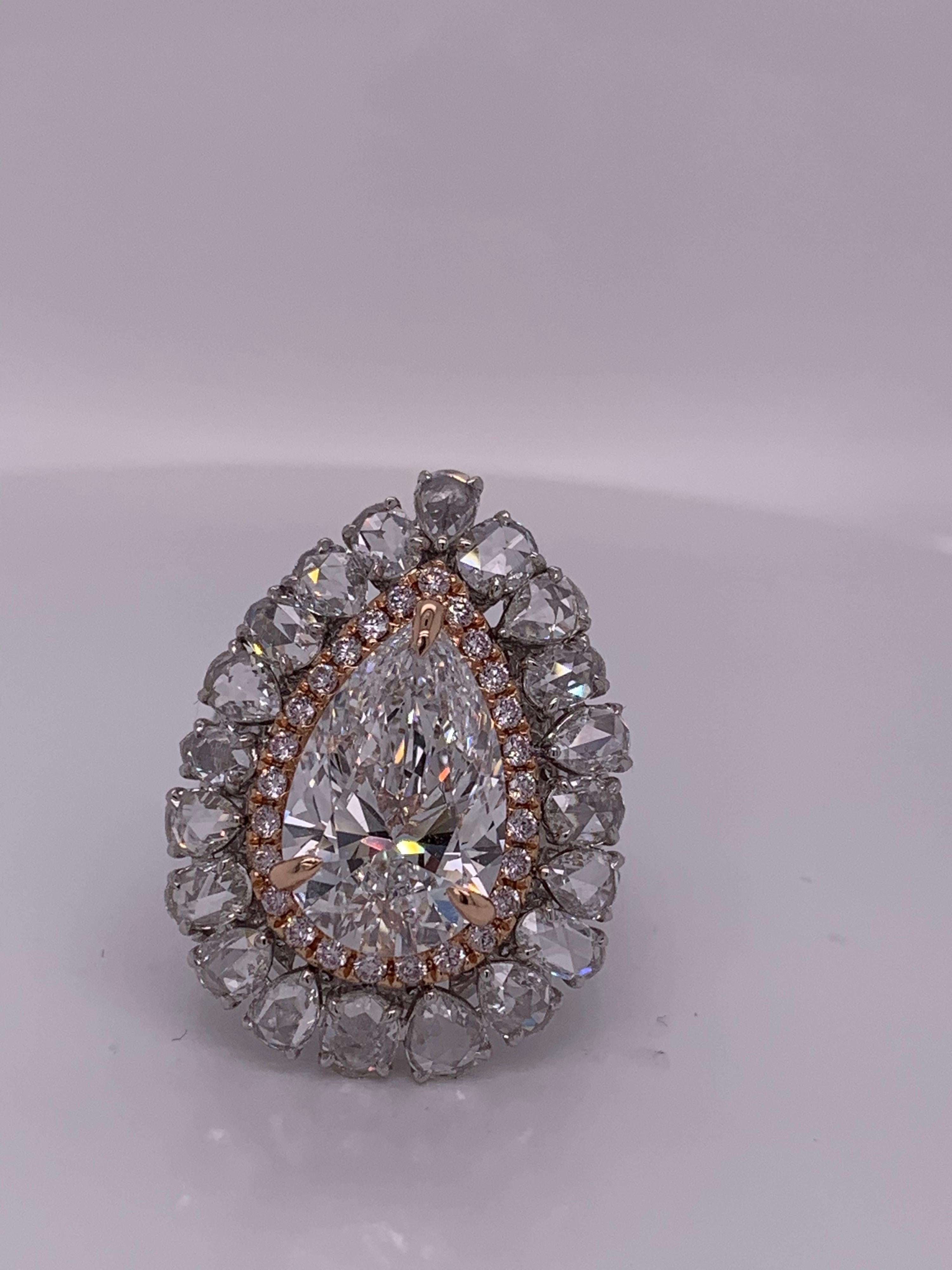 Artisan GIA Certified 6.02 Pears Shape Diamond Halo Ring