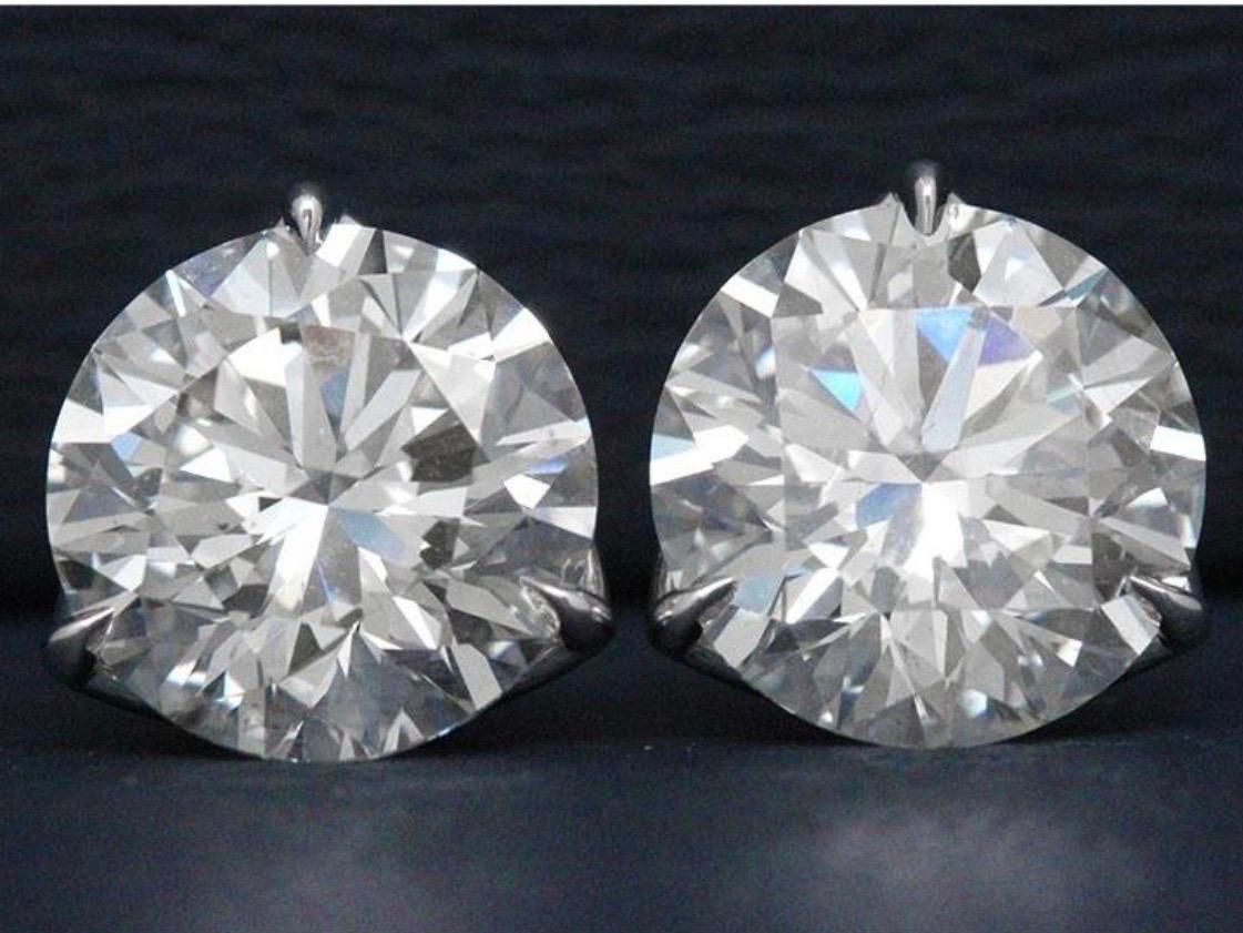 Round Cut GIA Certified 6.03 Carat Diamond Stud Earrings