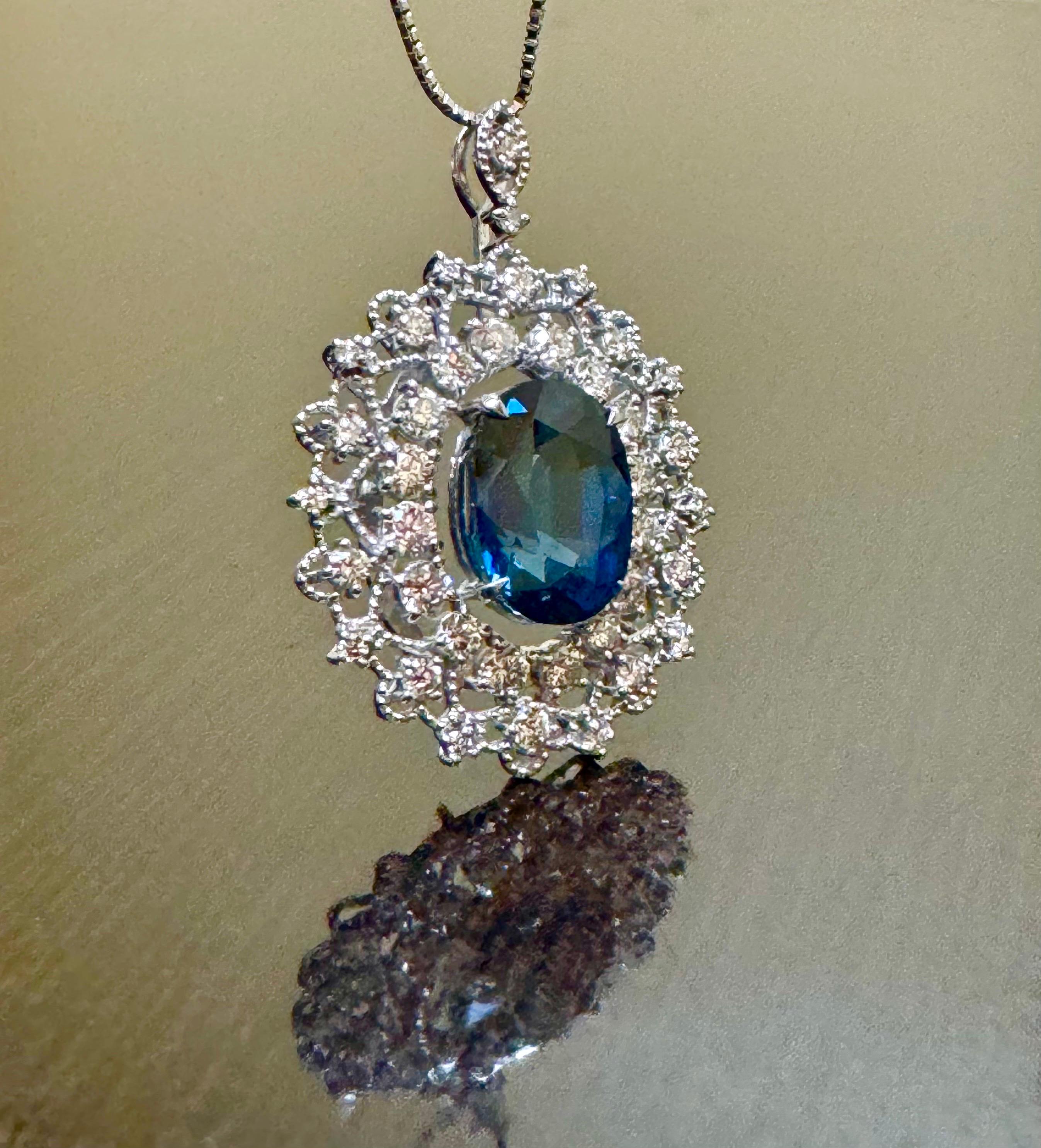 Women's GIA Certified 6.03 Carat Oval Blue Sapphire Platinum Diamond Necklace For Sale