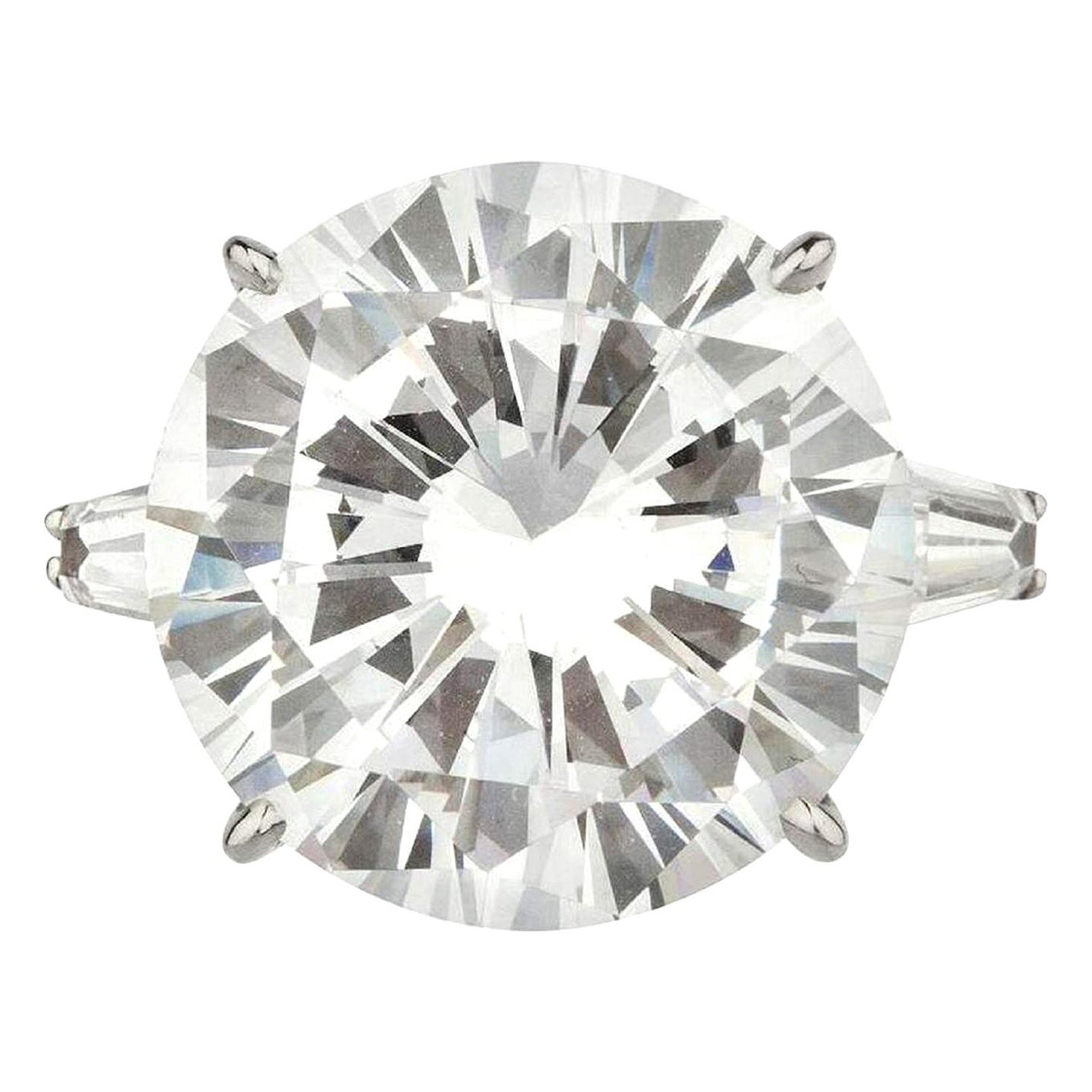 GIA Certified 6.08 Carat Round Cut Diamond D Color VVS2 with tapered baguette