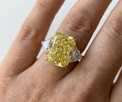 GIA Certified 6.05 Carat Fancy Yellow Elongated Diamond Three-Stone Ring