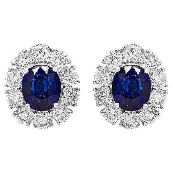 GIA Certified 6.05 Carats Oval Cut Blue Sapphire and Diamond Halo Clip Earrings