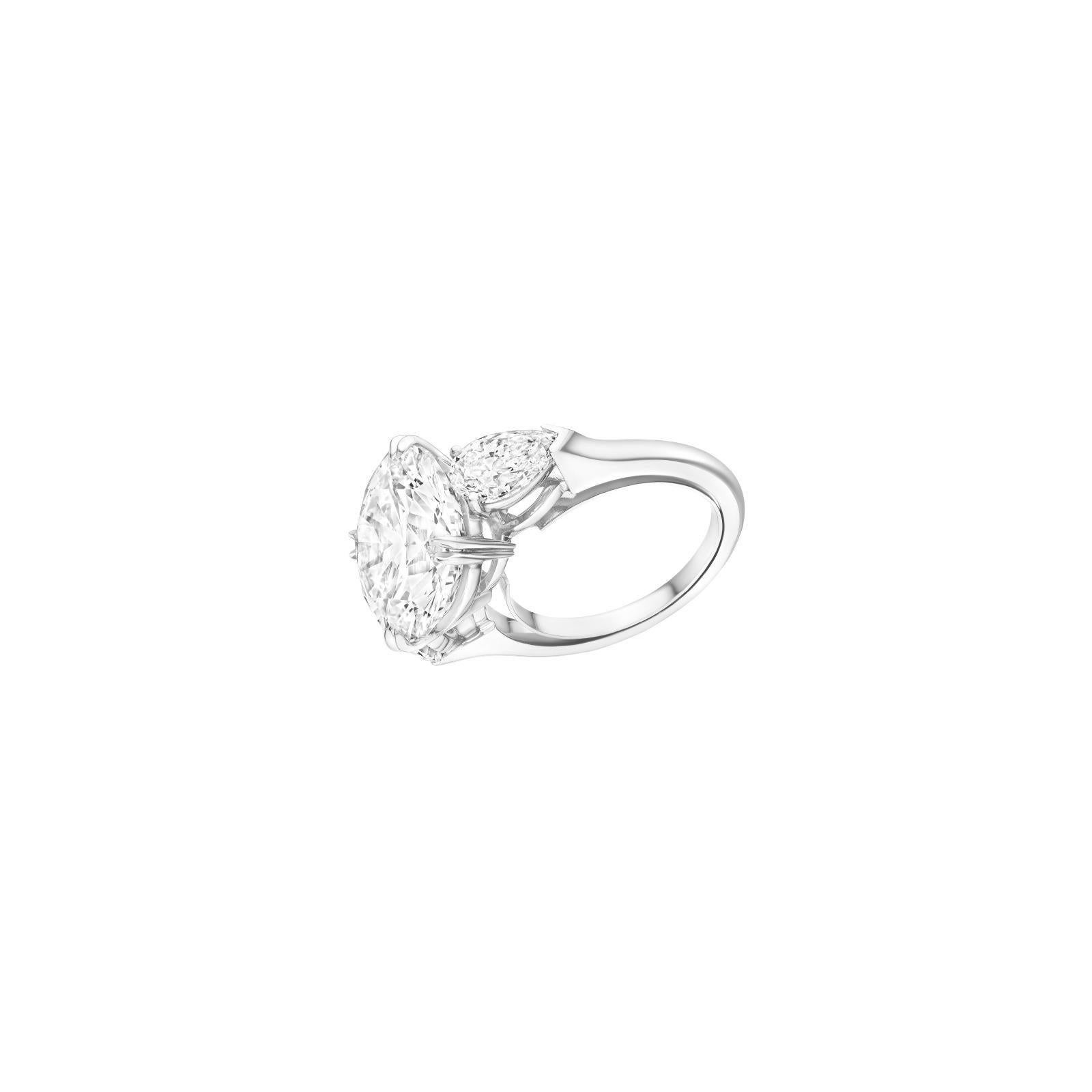 Cette bague solitaire exquise est ornée d'un diamant rond de 6.06 carats certifié par la GIA, taillé en brillant, serti dans un design intemporel en platine. Le diamant est d'une qualité exceptionnelle et présente les caractéristiques suivantes