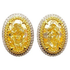 GIA Certified 6.06ct Oval Y-X 'Yellow' Diamond Earrings