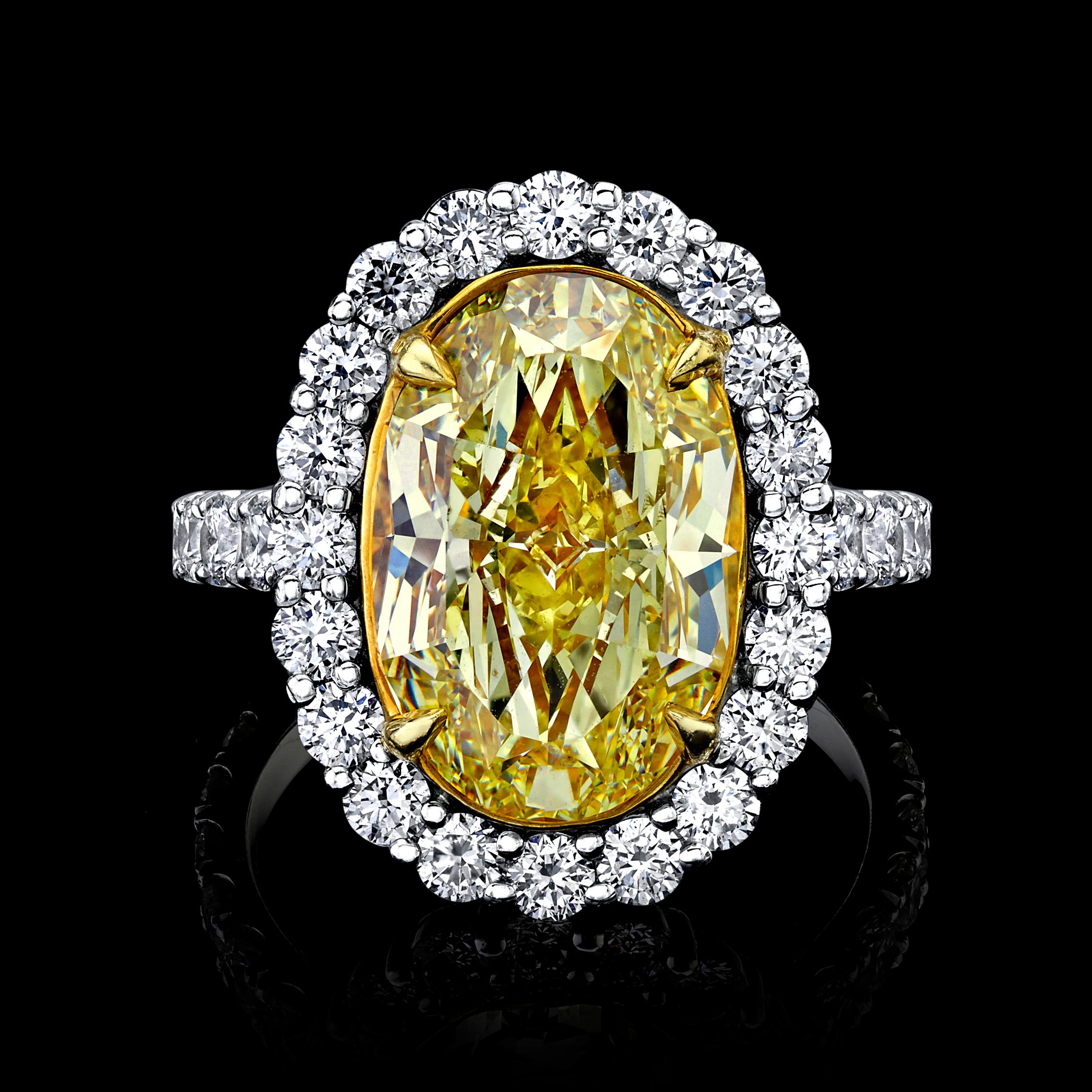 Modern GIA Certified 6.08 Carat, Oval Cut, Fancy Intense Yellow Diamond Ring For Sale
