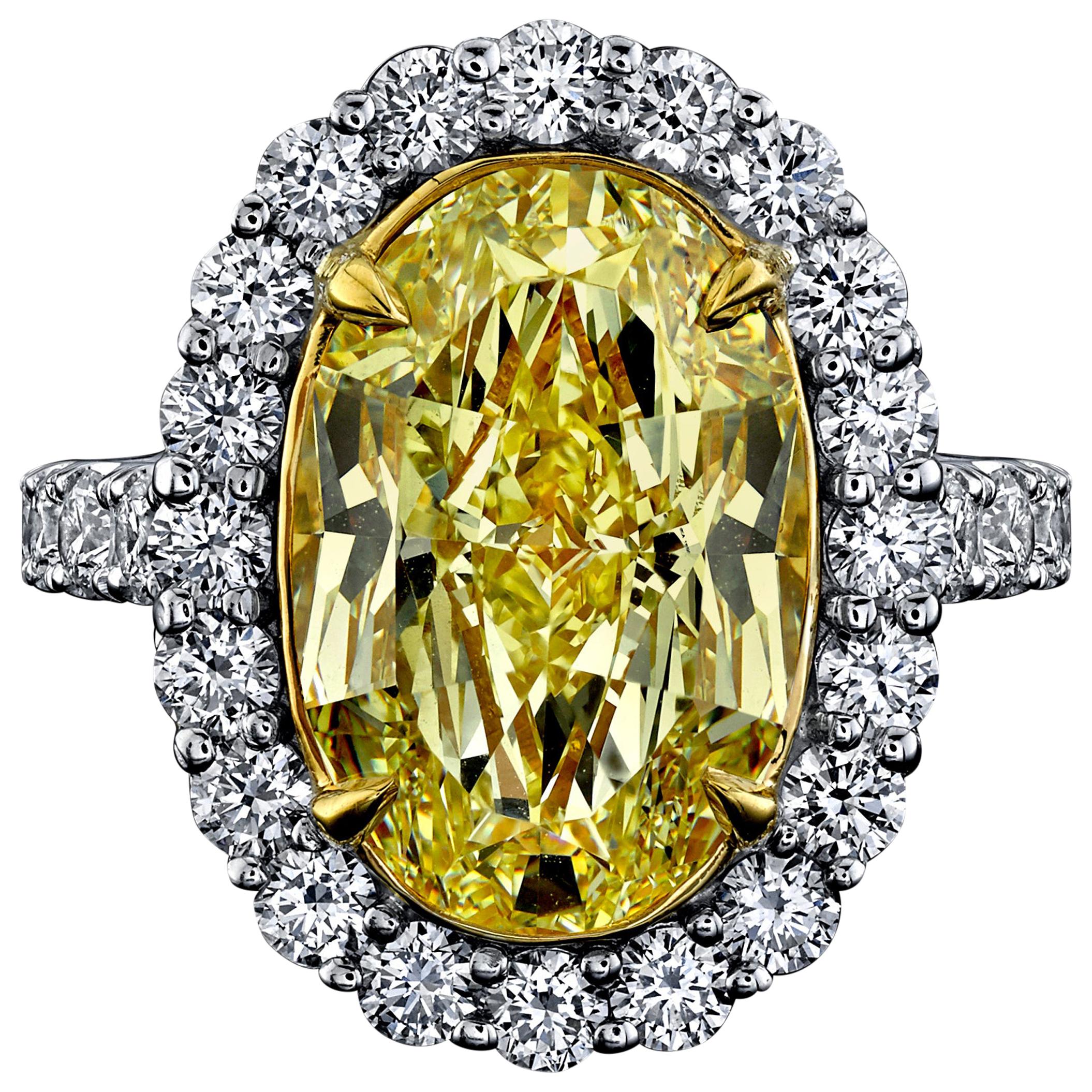 GIA Certified 6.08 Carat, Oval Cut, Fancy Intense Yellow Diamond Ring For Sale