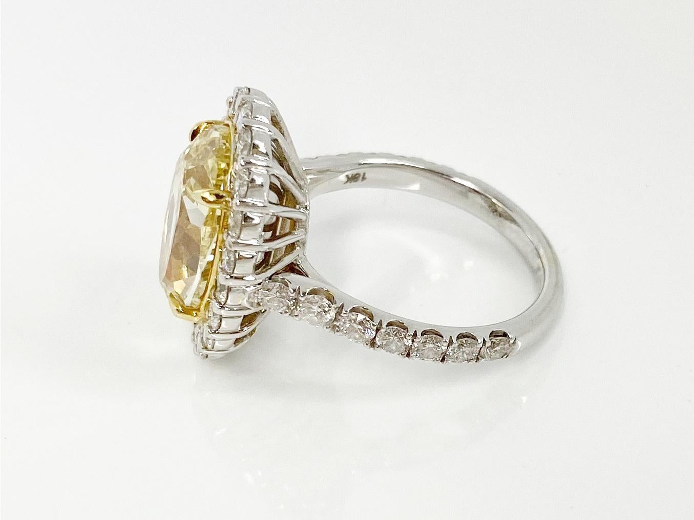 GIA Certified 6.08 Carat, Oval Cut, Fancy Intense Yellow Diamond Ring In New Condition For Sale In Calabasas, CA