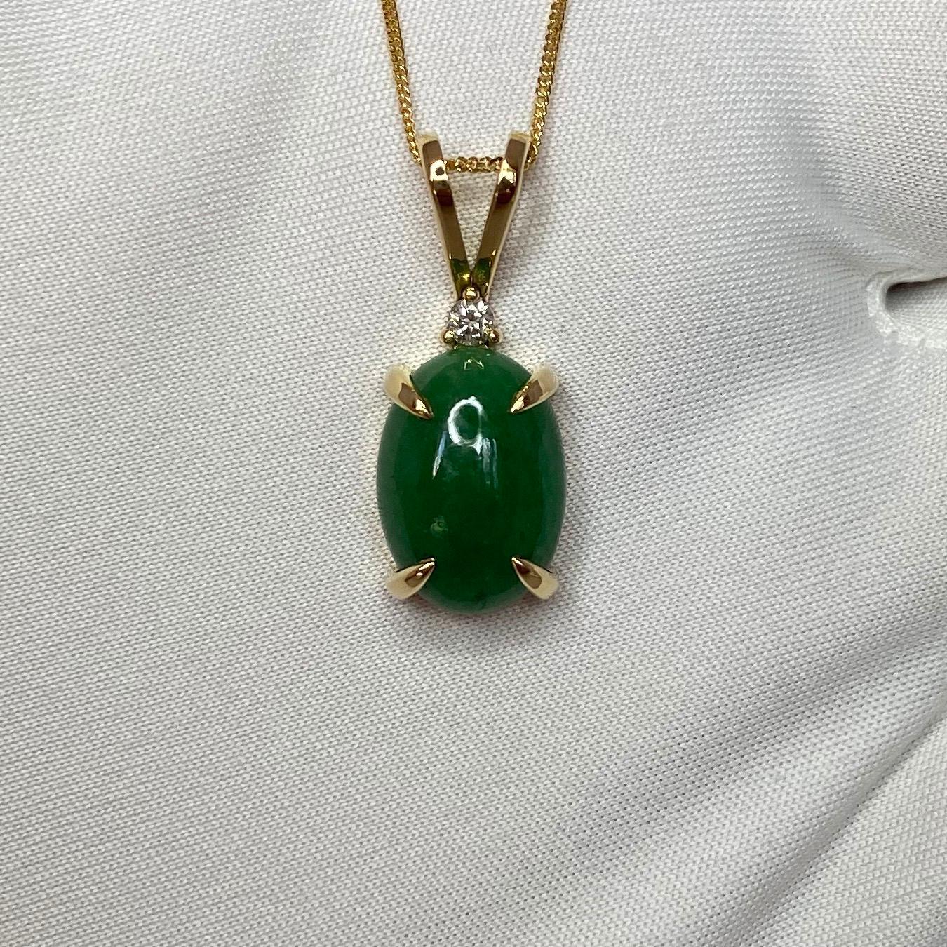 Bright Green Jade & Diamond 18k Yellow Gold Pendant Necklace.

GIA Certified 6.09ct untreated A grade jadeite with a bright green colour and excellent oval cabochon cut. It's very difficult to photograph cabochons due to how the dome reflects light,