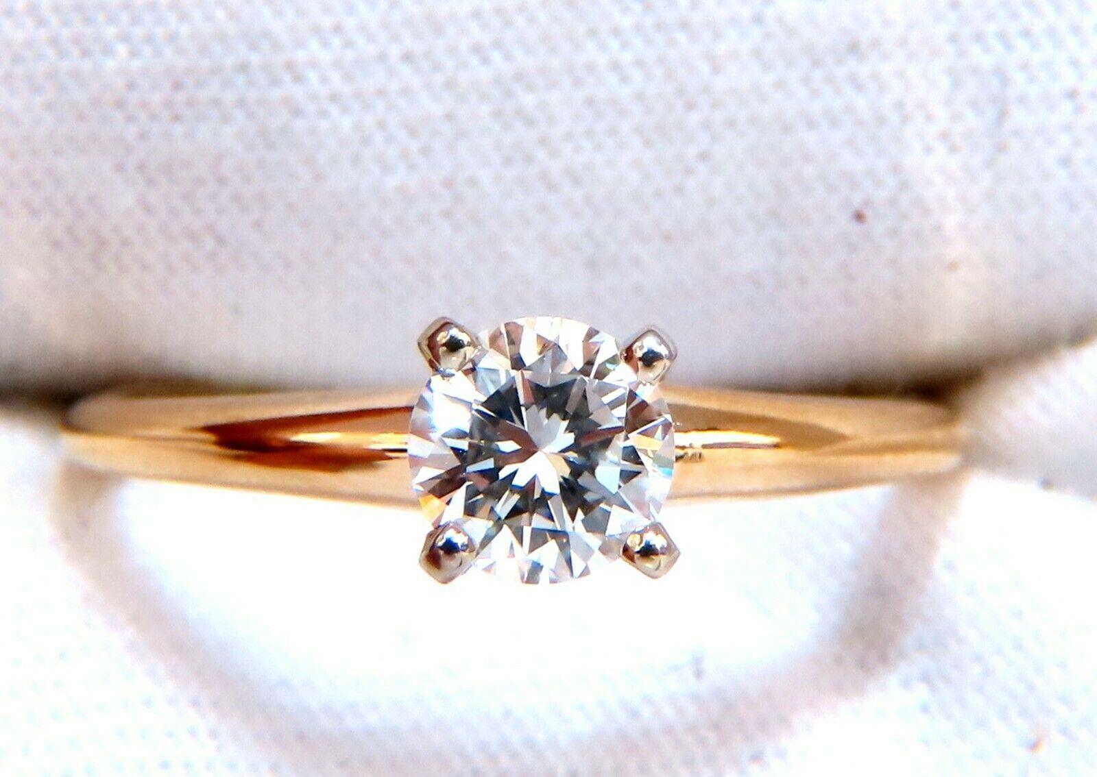 GIA Certified Diamond engagement ring.


Solitaire Classic

GIA Certificate:  5202967880

.60ct.  Natural Round Cut diamond

G color Vs2 clarity 

(Please see report copy attached)

14kt yellow gold

Ring size: 7

We may resize.

Depth of ring: