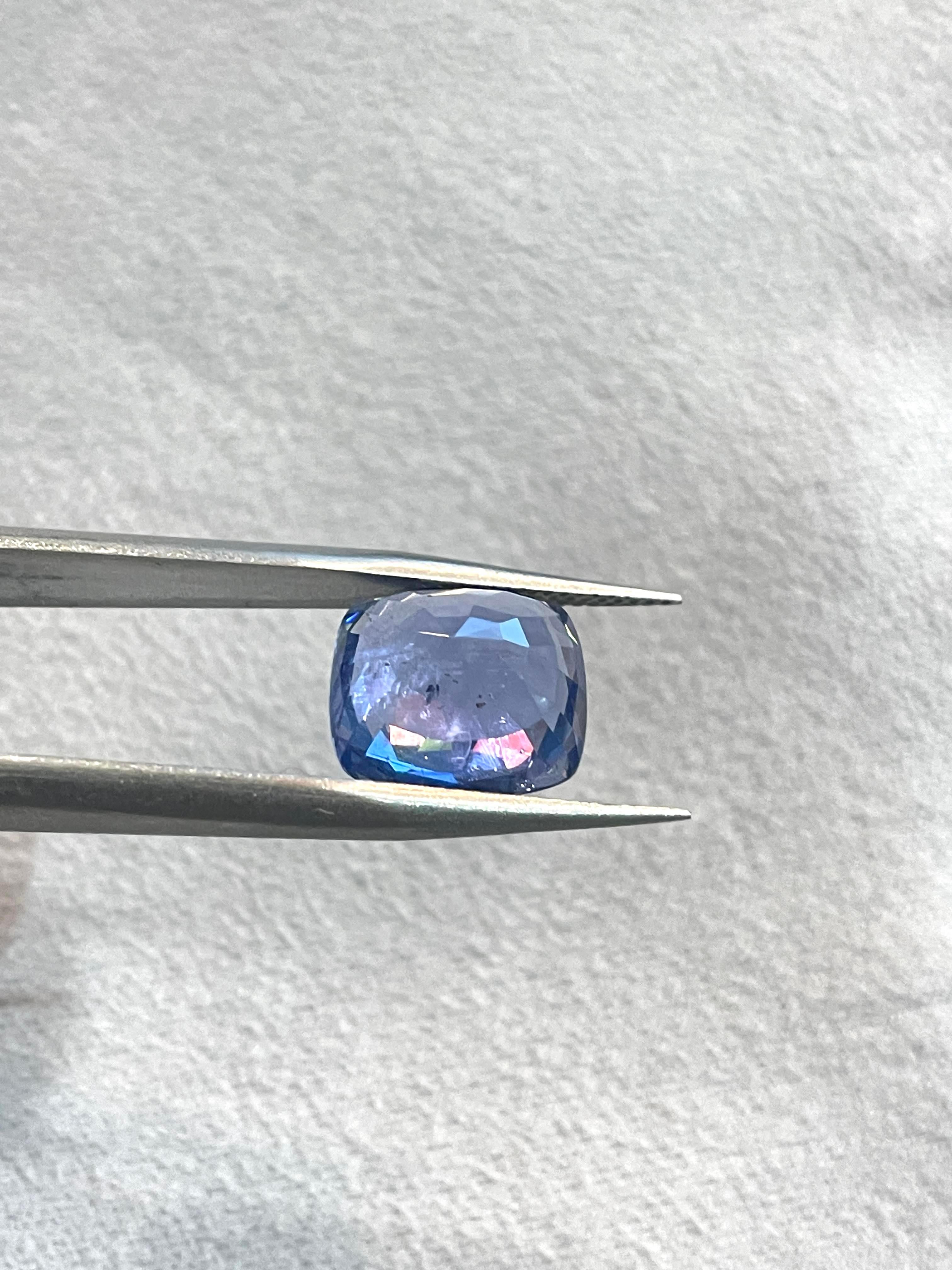 Cushion Cut GIA Certified 6.10 carat blue sapphire with no indications of heating For Sale