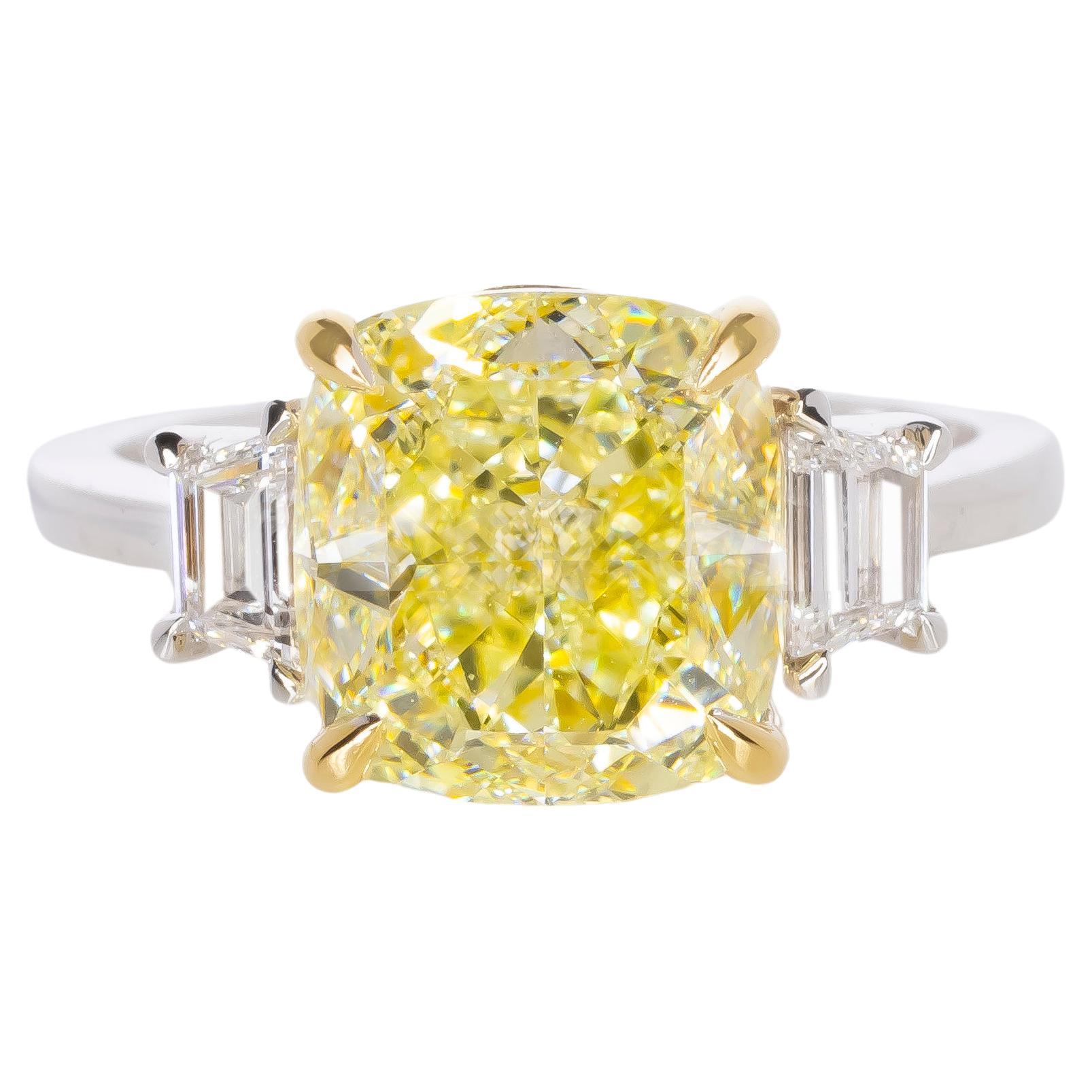 GIA Certified 6.12 Carat Cushion VVS2 Fancy Yellow Diamond Platinum Ring For Sale