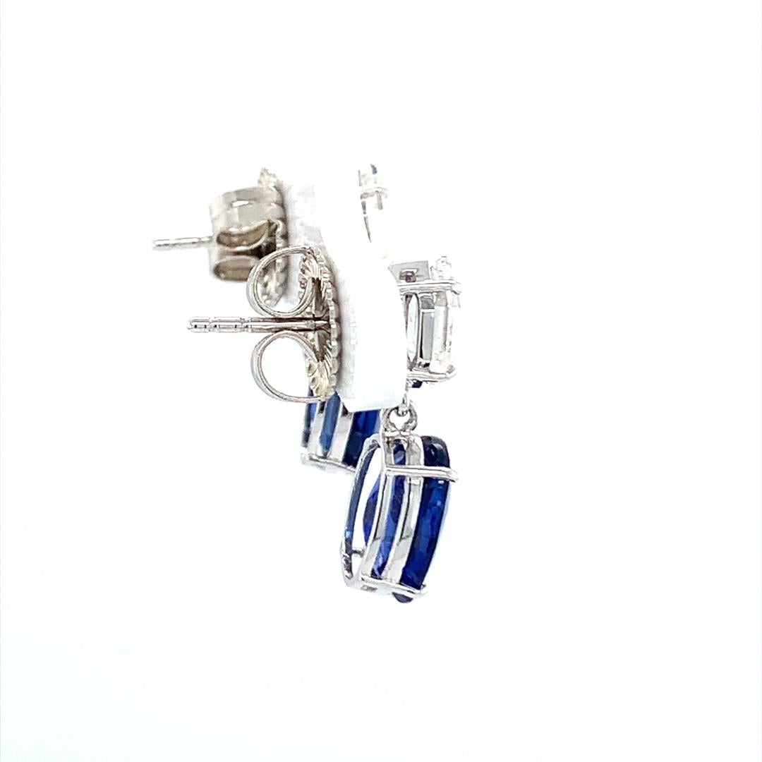 Oval Cut GIA Certified 6.14 Carat Blue sapphire Dangle drop earring with Diamond For Sale