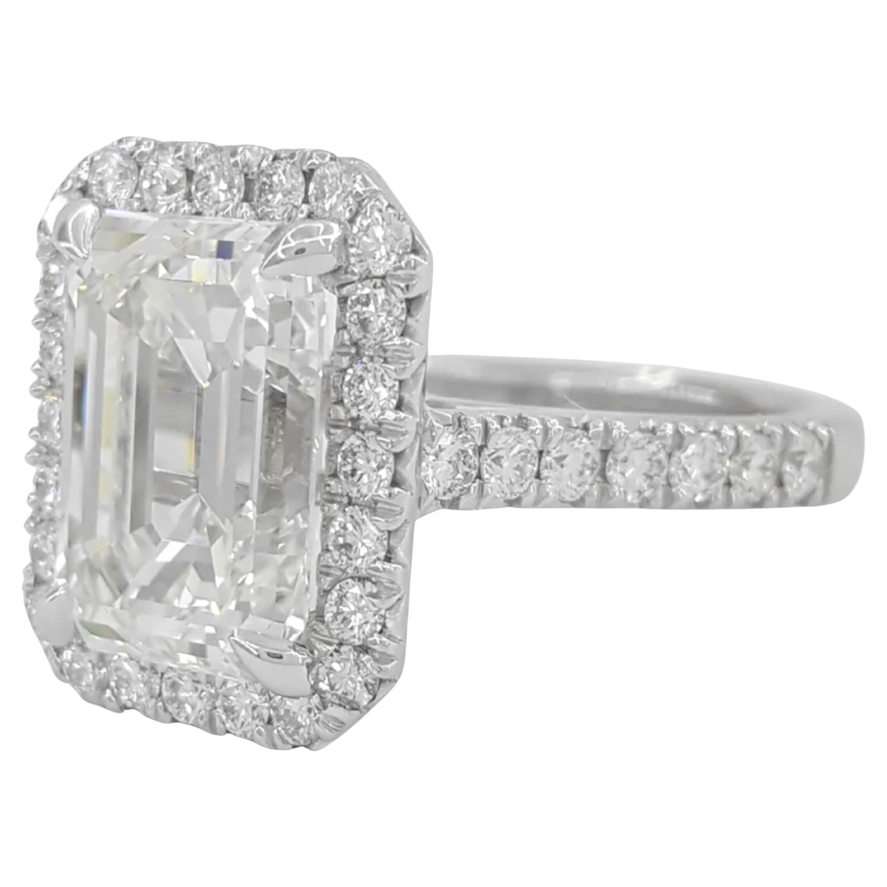 Contemporary GIA Certified 6.14 Carat Emerald Cut Diamond Engagement Platinum Ring For Sale