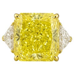 Anillo de platino y oro amarillo de 18 quilates con diamante amarillo fantasía de 6,16 quilates certificado por el GIA