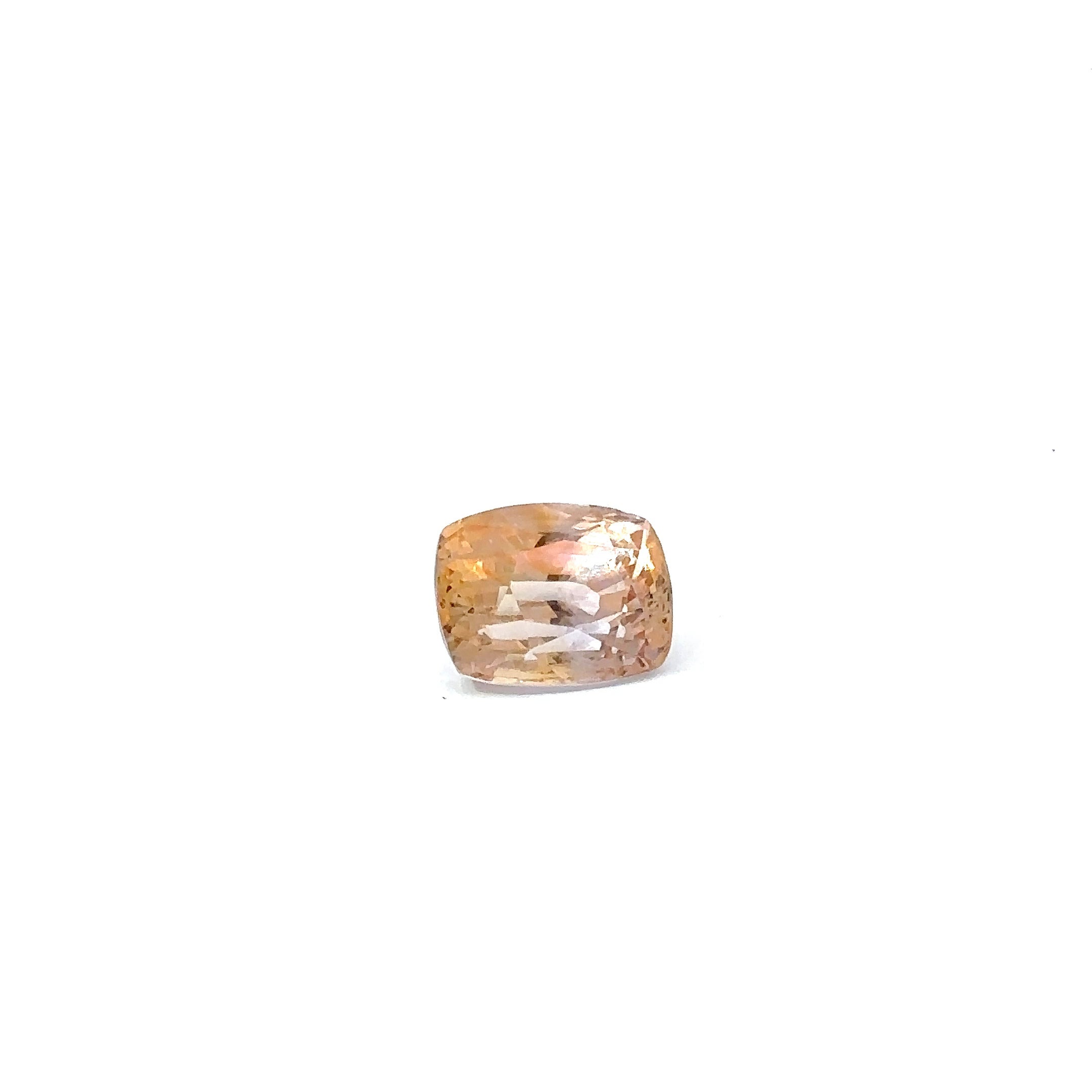 Corindon naturel Saphir 
Forme coussin Coupe brillante
Transparent
Jaune orangé
6,16 carats
