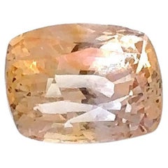 GIA Certified 6.16 Carat Heated Sapphire ( Orangy Yellow)