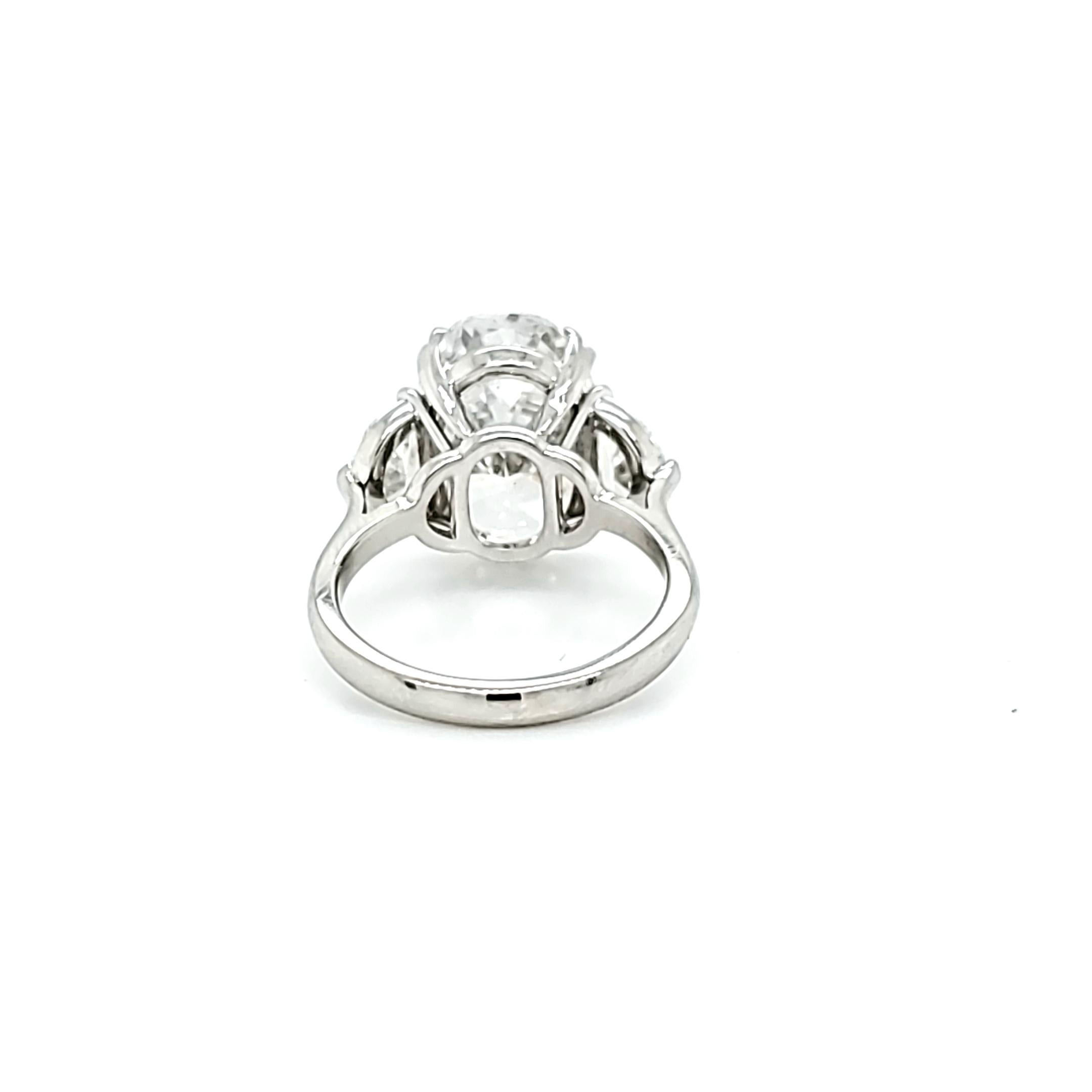 GIA Certified 6.16 Carat Oval Cut Diamond Three-Stone Ring 1