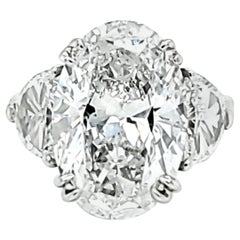 GIA Certified 6.16 Carat Oval Cut Diamond Three-Stone Ring