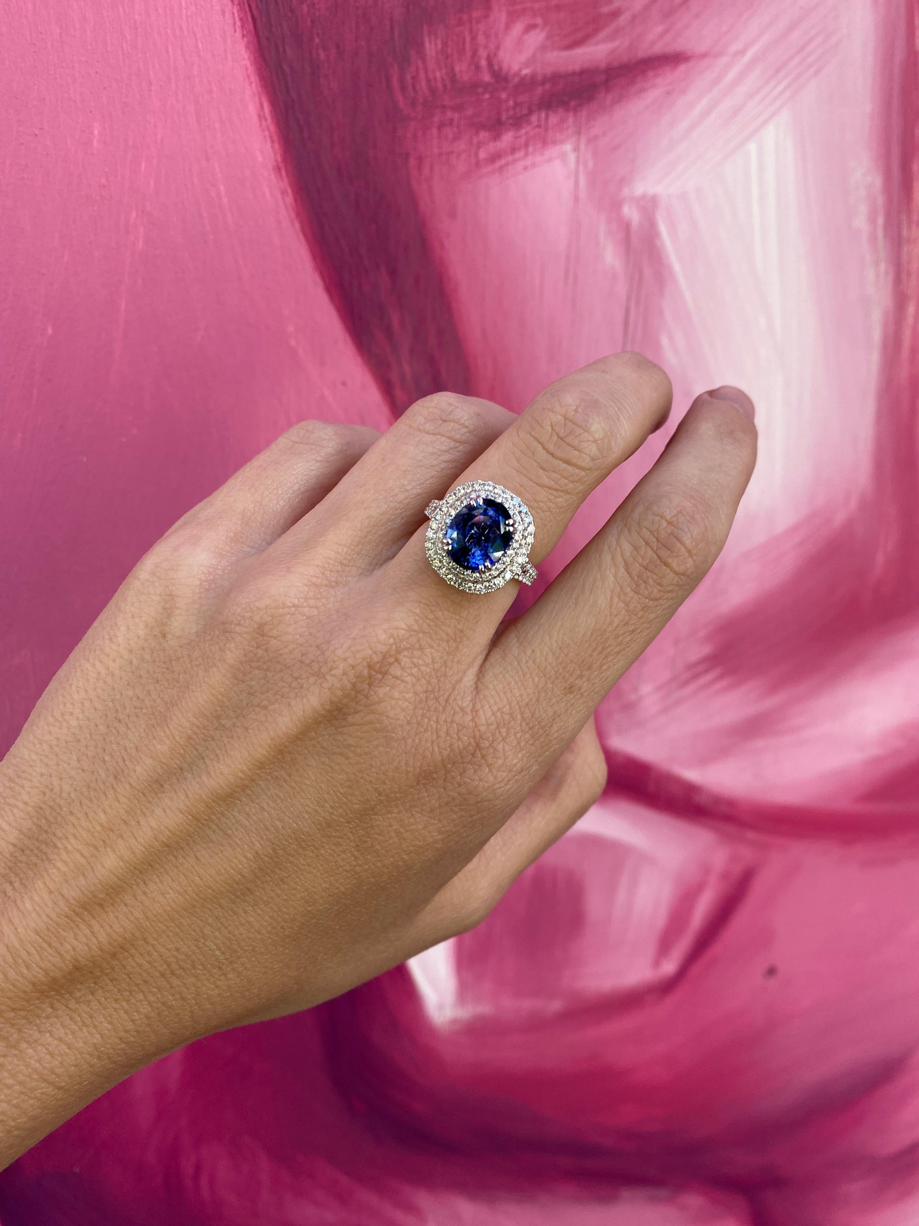 GIA Certified 6.18 Carat Oval Shaped Sri Lankan Sapphire & Diamond Ring For Sale 8