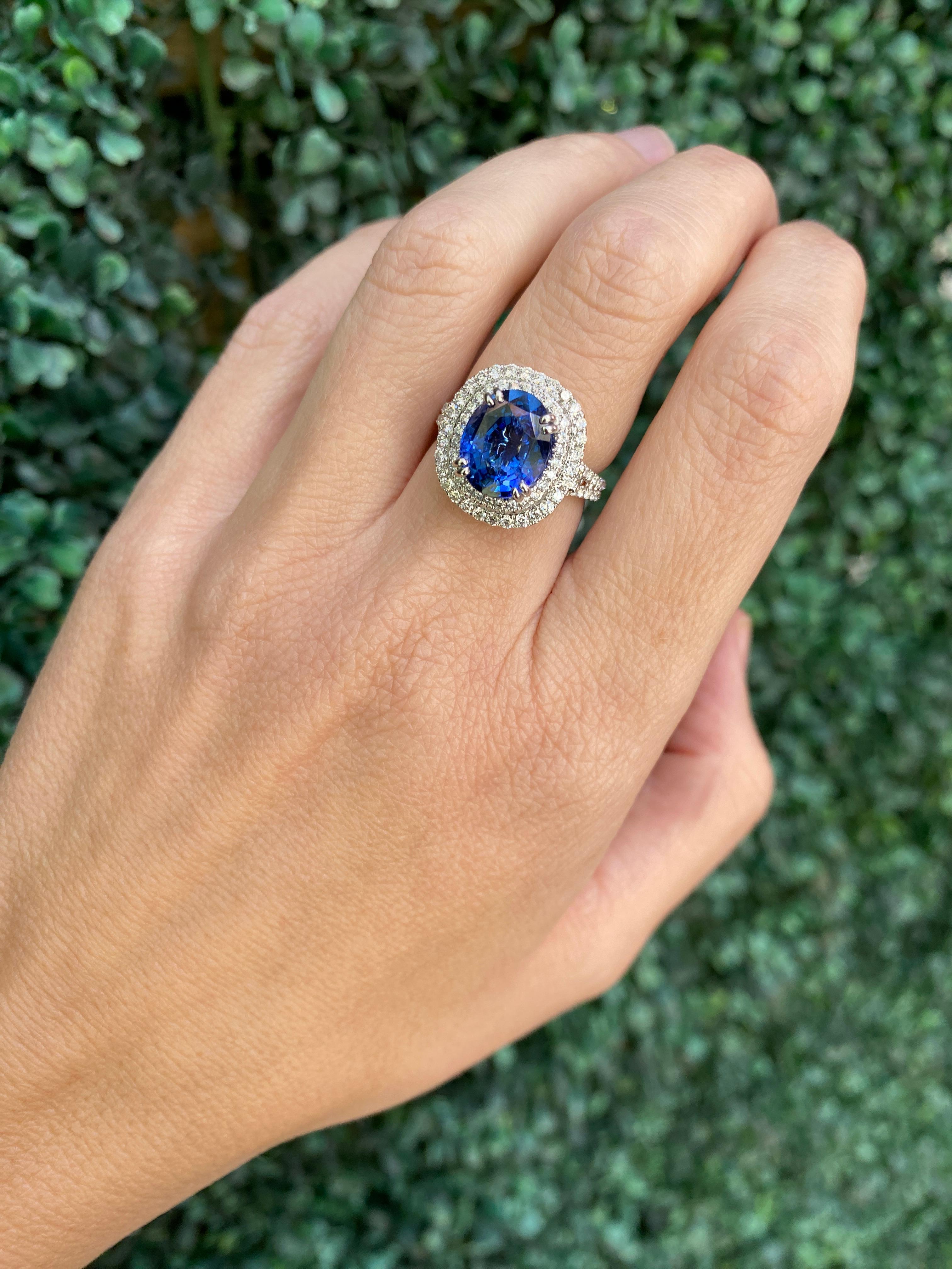 GIA Certified 6.18 Carat Oval Shaped Sri Lankan Sapphire & Diamond Ring For Sale 9