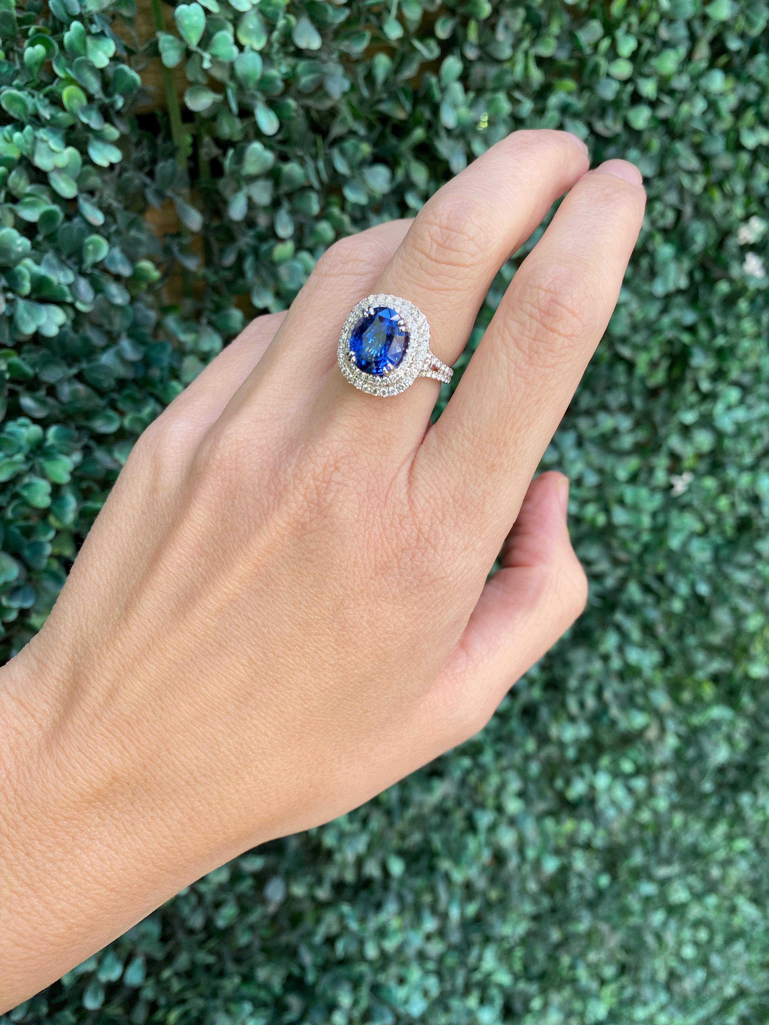 GIA Certified 6.18 Carat Oval Shaped Sri Lankan Sapphire & Diamond Ring For Sale 11