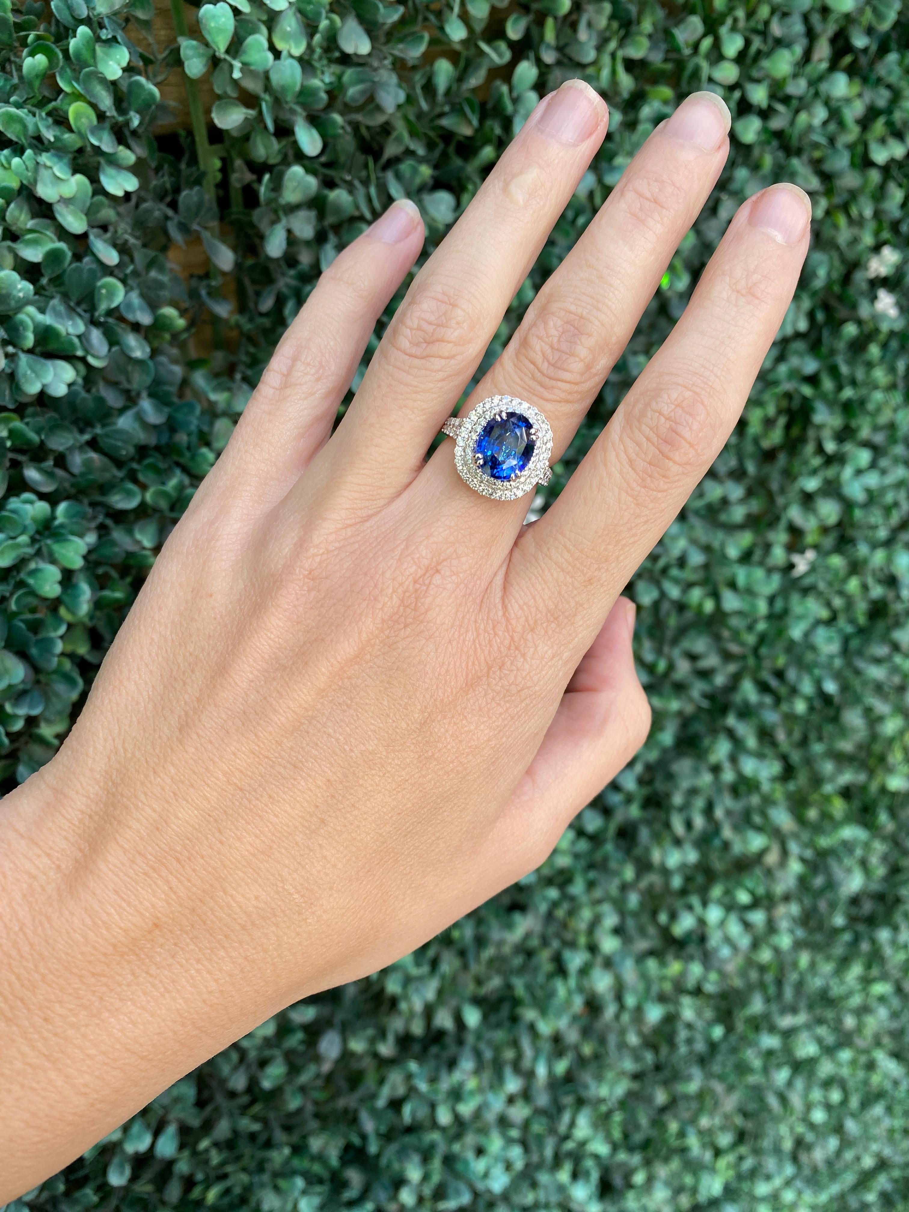 GIA Certified 6.18 Carat Oval Shaped Sri Lankan Sapphire & Diamond Ring For Sale 12