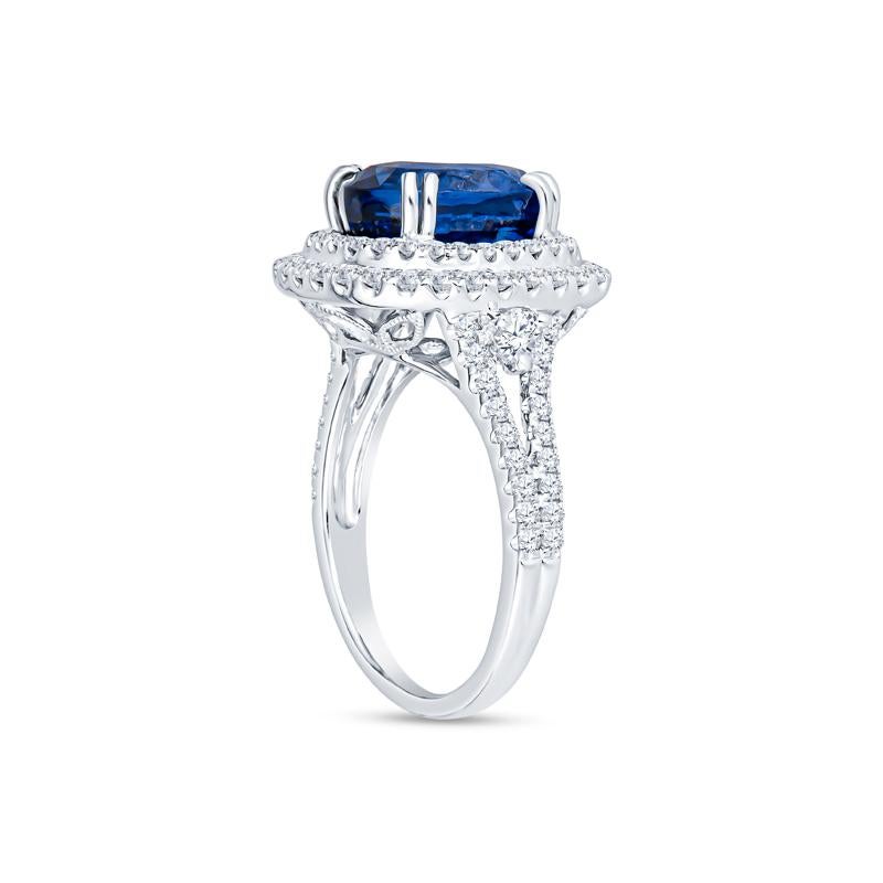 This 6.18ct oval shape natural blue Sri Lankan sapphire is GIA certified and set in an 18kt white gold double halo ring with 1.10ct total weight in round brilliant cut natural diamonds. Perfect for any special occasion or as an engagement ring. This