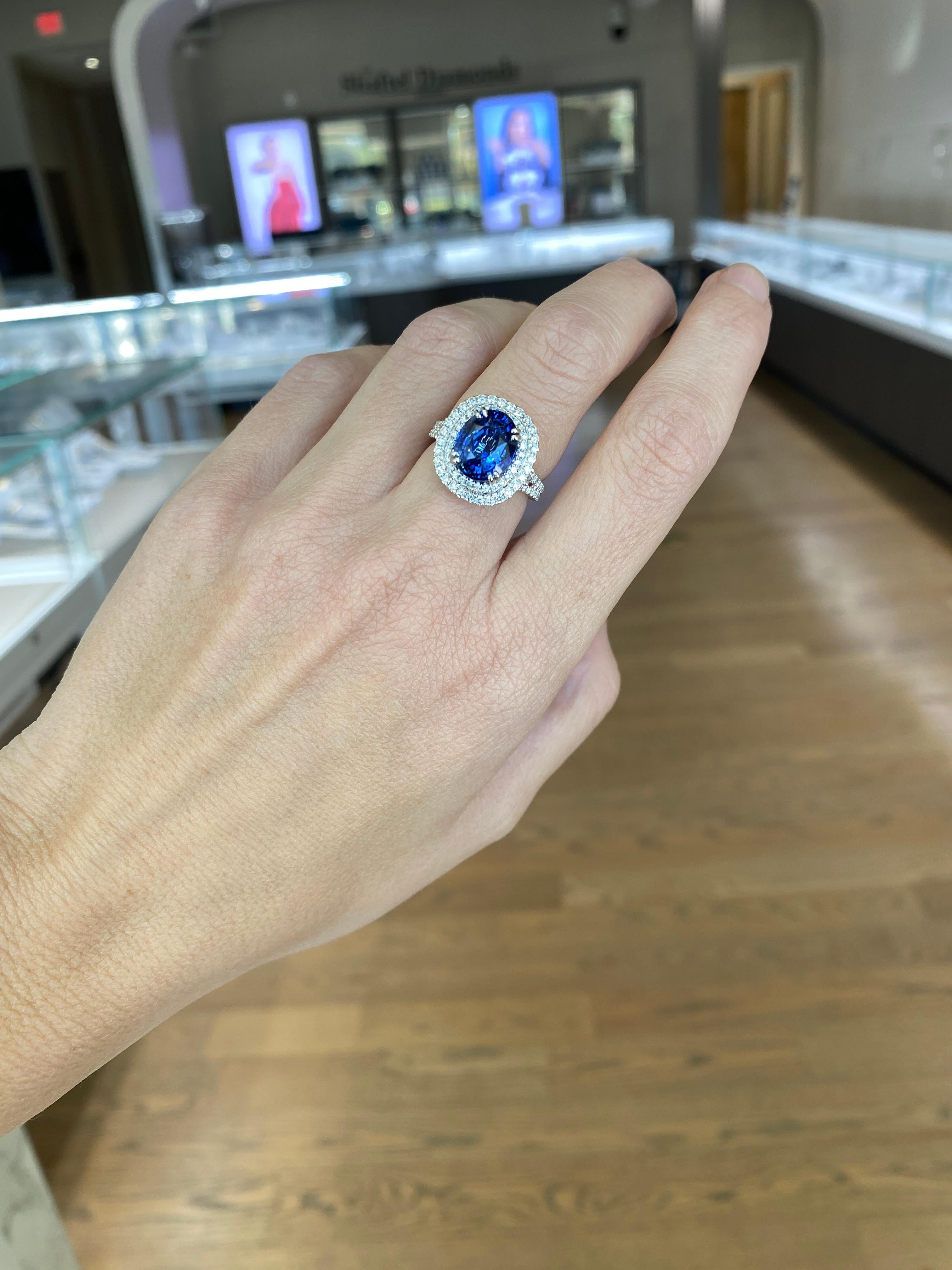 GIA Certified 6.18 Carat Oval Shaped Sri Lankan Sapphire & Diamond Ring For Sale 2