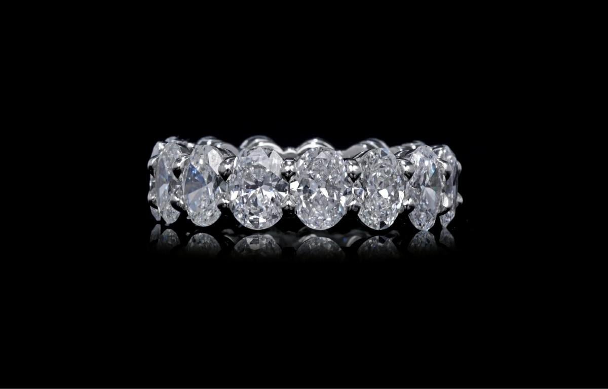 GIA  Certified 6.18 Ctw. Oval Cut Diamond Eternity Band in Platinum In New Condition For Sale In San Francisco, CA