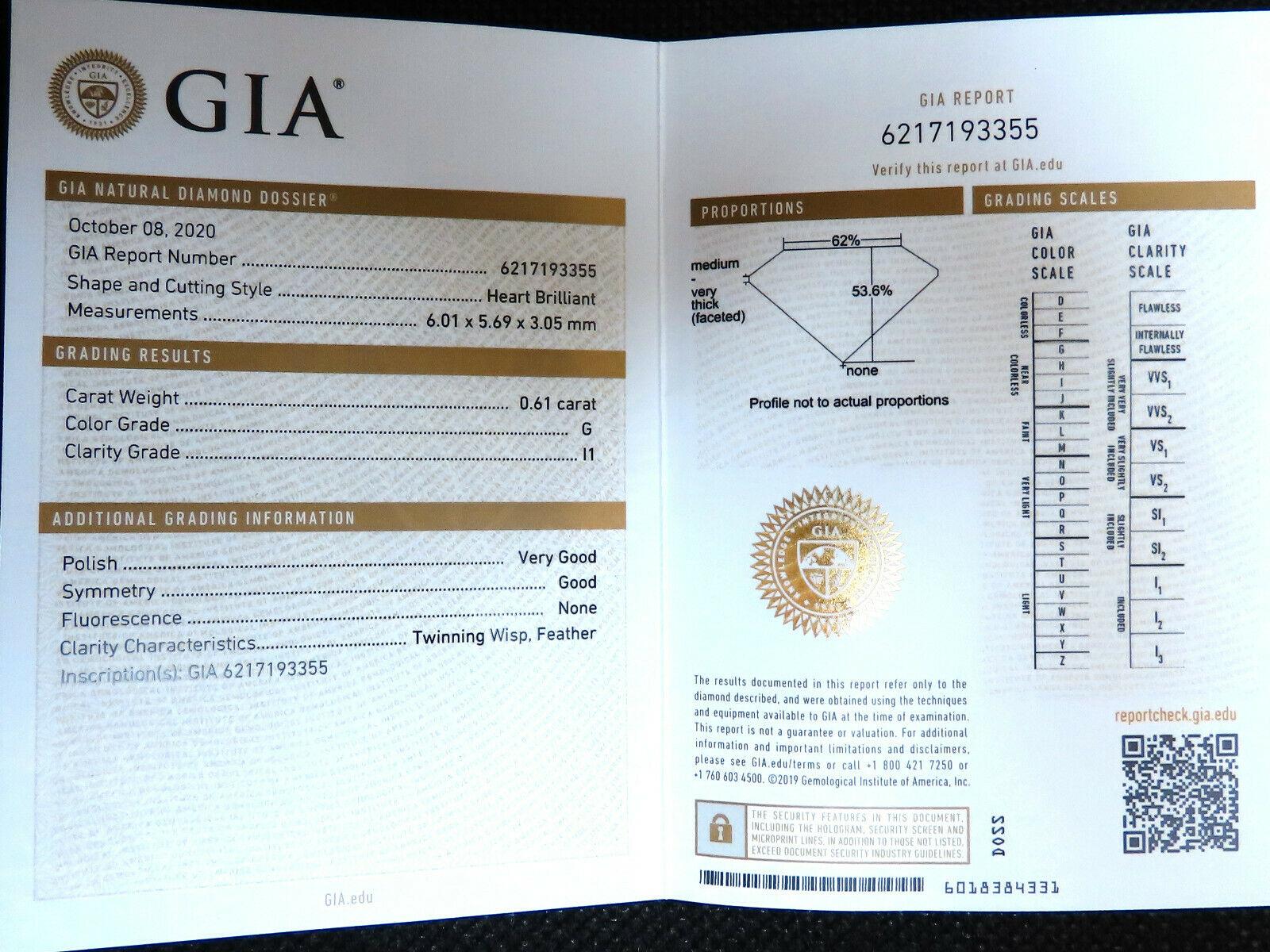 GIA Certified .61ct. Heart cut diamond  ring.

 Report: 6217193355

G-color, I1 Clarity

Side Diamonds: .20ct

G-color Vs-2 clarity

(GIA Report attached)

14Kt yellow gold

9.2 grams.

current size: 6.75

May be resized, please inquire.

Depth:
