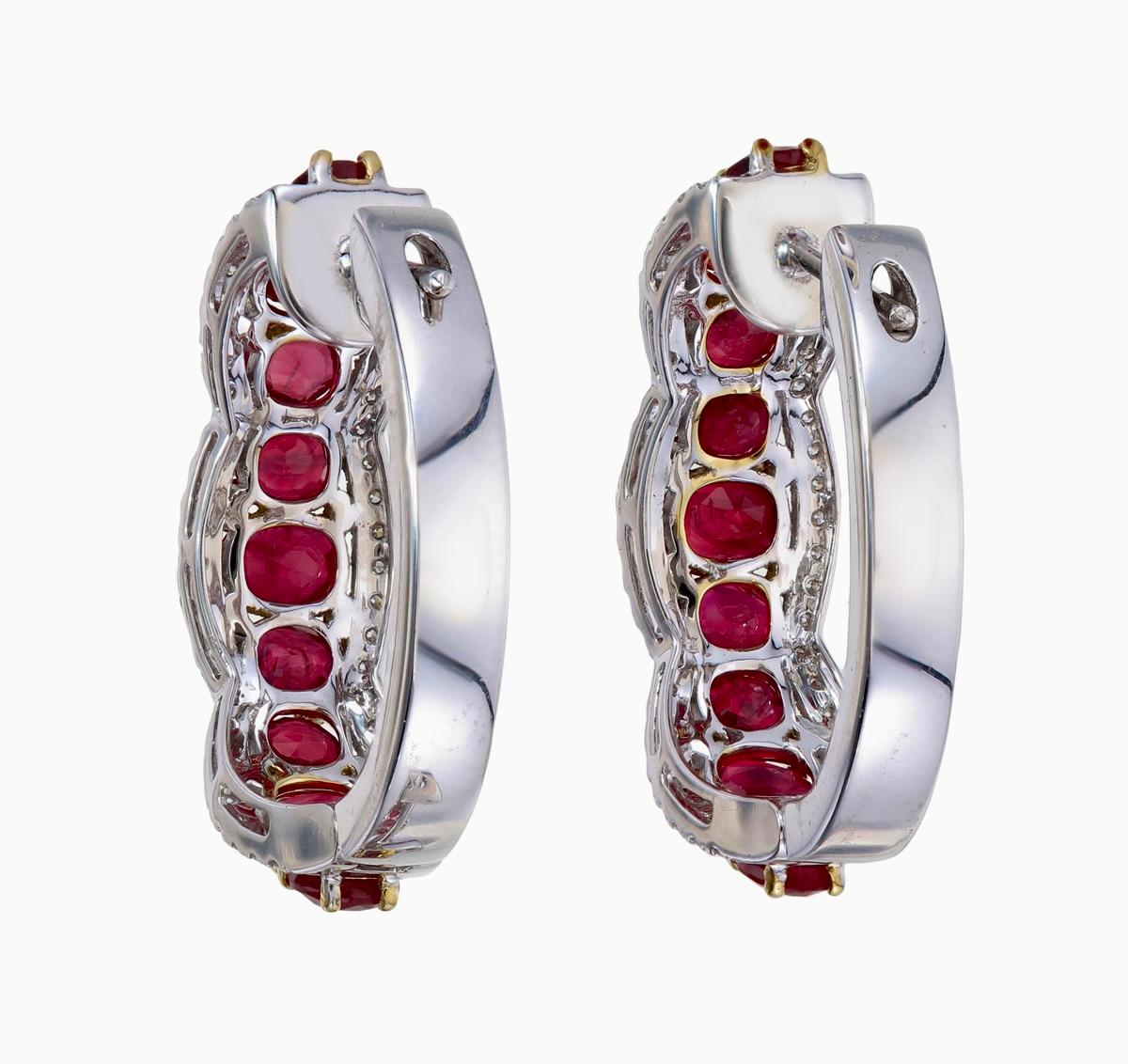 Exclusive ruby and diamond earrings are made by Rewa jewels in 18 karat white gold.

There are 18 pieces of oval shaped untreated Burma rubies weighing  approximately 6.21 carat total. The rubies are pigeon blood in colour. The rubies in these pair