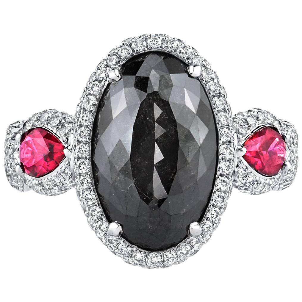 GIA Certified 6.21 Carat Oval Fancy Black Diamond with 2 Rubies For Sale