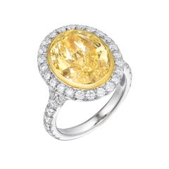 GIA Certified 5.12 Ct Fancy Yellow Oval Diamond Engagement Ring in Platinum
