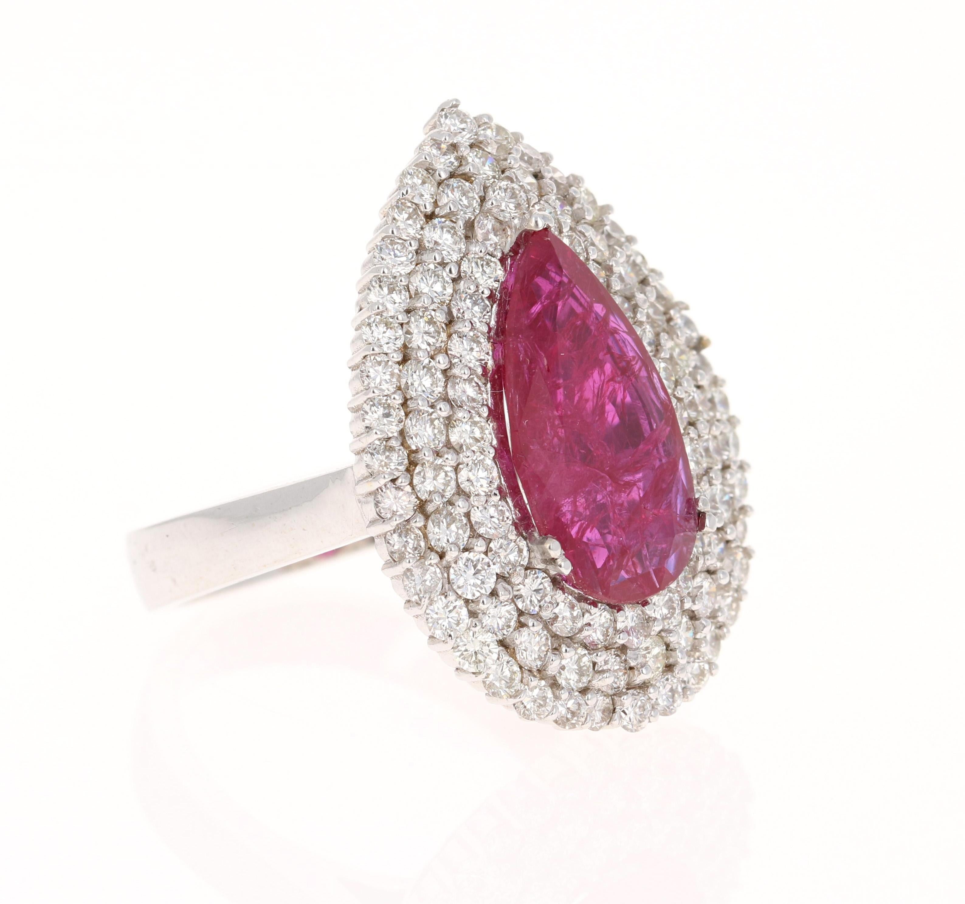 This ring has a Natural Pear Cut GIA Certified Ruby that weighs 3.90 carats. It is surrounded by 92 Round Cut Natural Diamonds that weigh 2.33 carats. The total carat weight of the ring is 6.23 carats. The clarity and color of the diamonds are VS-H.