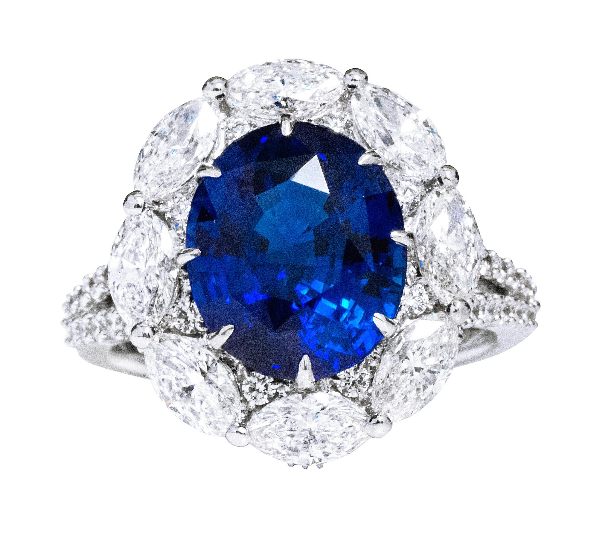 Oval Cut GIA Certified 6.29 Carat Royal Blue Sapphire and Diamond Cocktail Ring For Sale