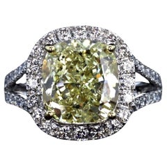 GIA certified 6.29ct Fancy Yellow Cushion Cut Diamonds Ring
