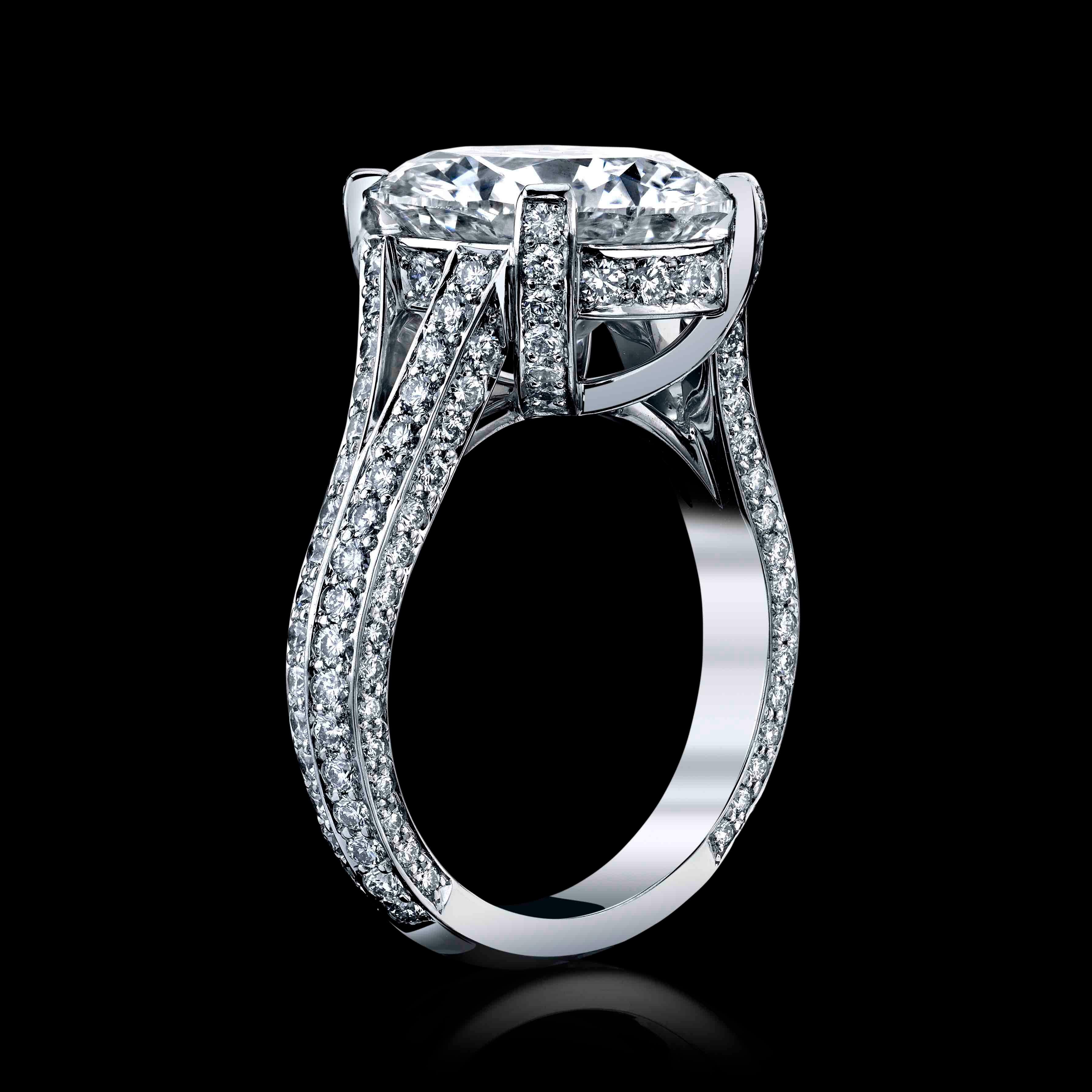 Facing up large and beautiful this 6.31ct, J color, and SI2 clarity is set in a regal 18K White gold setting with 1.00cttw melee 
GIA #6177978457
