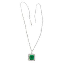 GIA Certified 6.33 Carat Minor Oil Colombian Emerald Necklace in 18K White Gold