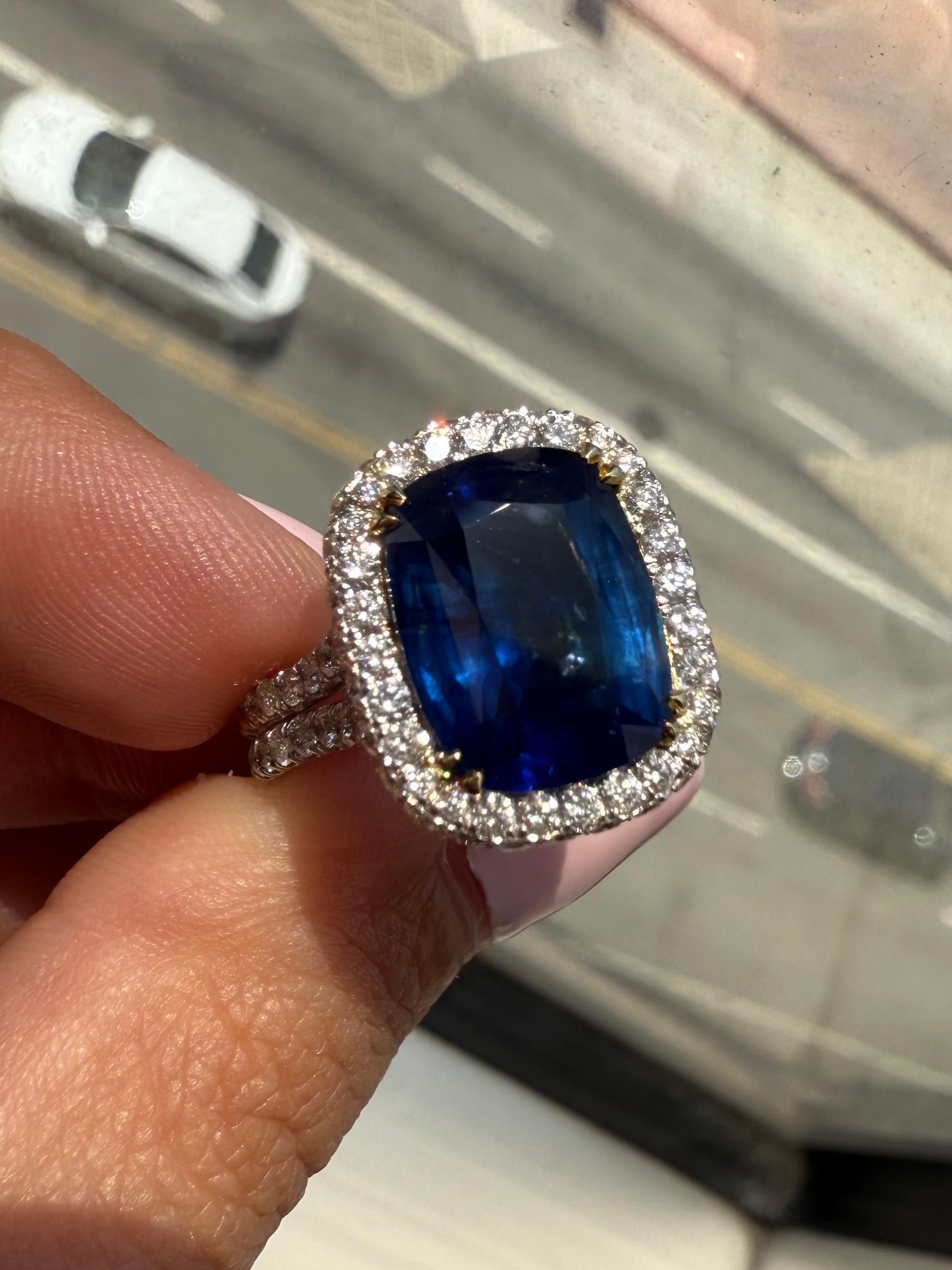 Modern GIA Certified 6.35 Sapphire and halo Diamond Ring For Sale