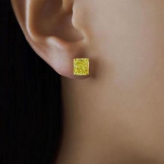 GIA Certified 6.39 Carat Fancy Yellow Cushion-Cut Diamond Stud Earrings