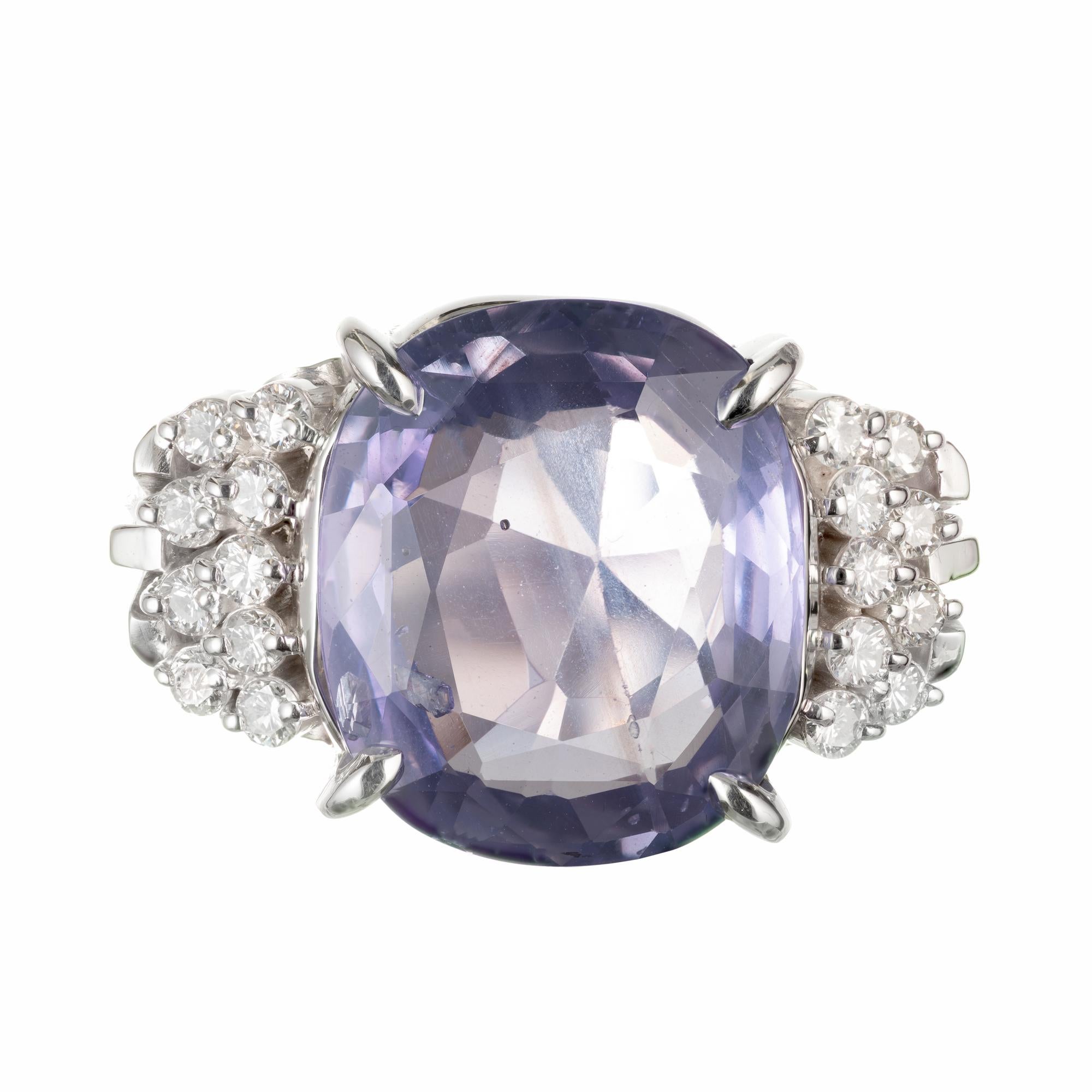 Light violet purple color change sapphire and diamond engagement ring. GIA certified center cushion cut sapphire center stone with round brilliant cut accent diamonda in its original platinum setting circa 1950-1960. GIA Certified natural no heat no