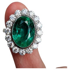 GIA Certified 6.40 CT Zambian Emerald Platinum and Diamond Ring