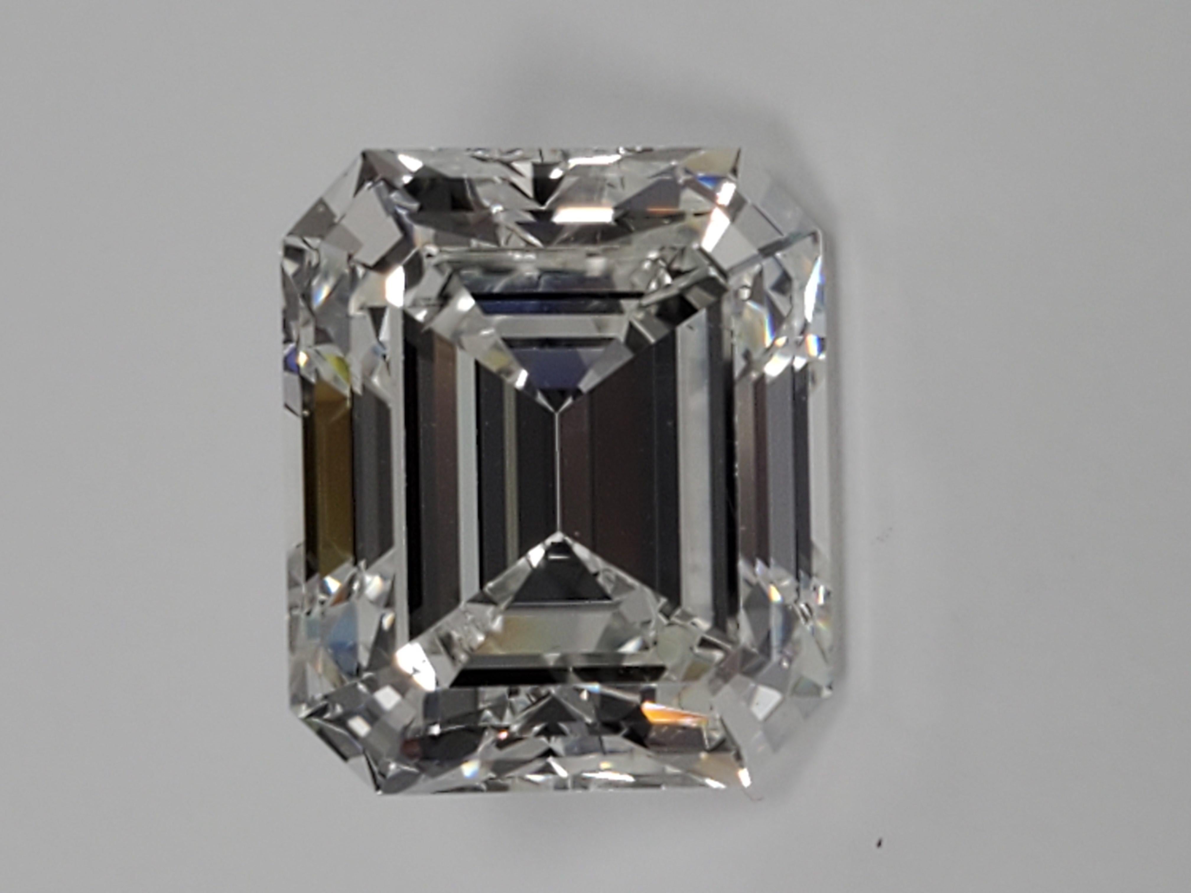 This GIA Certified 6.41 carat Emerald Cut Diamond was cut in our facility here at Louis Newman & Company. What makes this stone unique is that it is not long like most Emerald Cuts but this one is more on the wider side giving it a bigger look. Wear