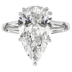GIA Certified 6.41 Carats Pear Shape Diamond Three Stone Ring