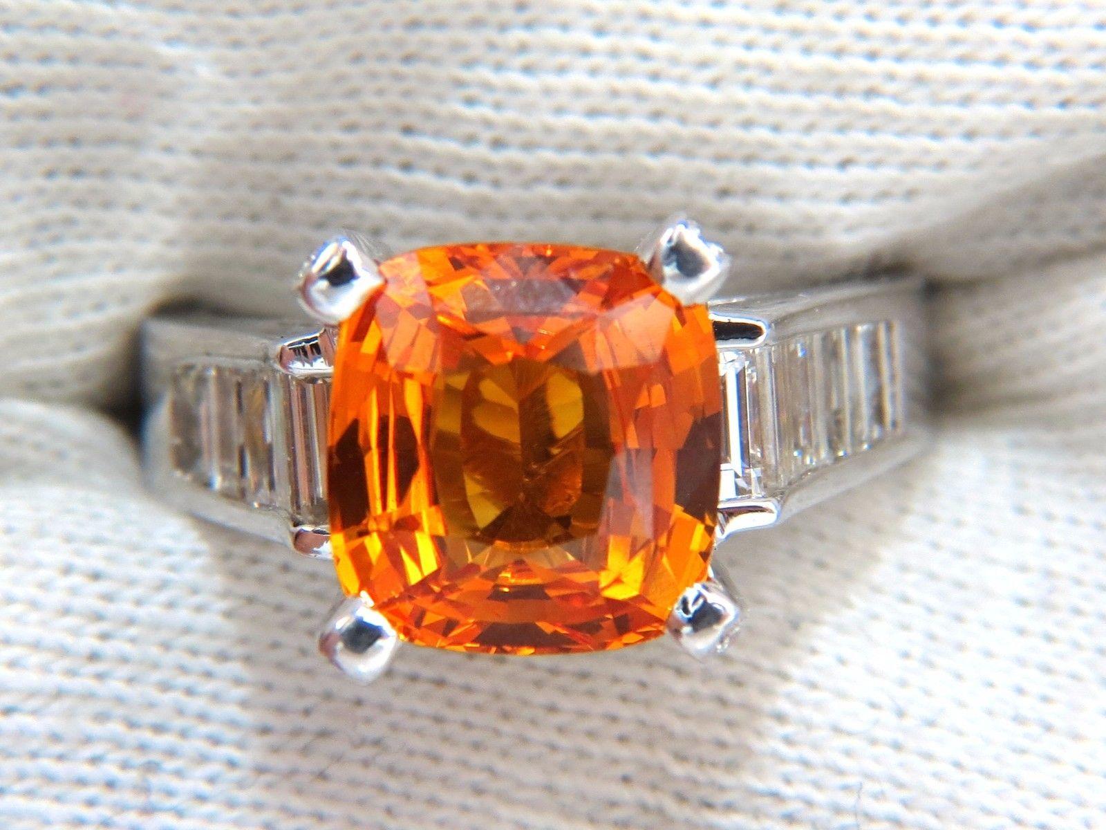 Raised Modern Orange Classic

GIA Certified 

5.11ct. Natural Sapphire ring.

Report:  2171413015 (to accompany)

cushion cut: 10.03 X 9.57  X 5.45mm

Transparent, vivid orange & Clean Clarity.



1.30ct. Side natural  baguette & round diamonds

F/