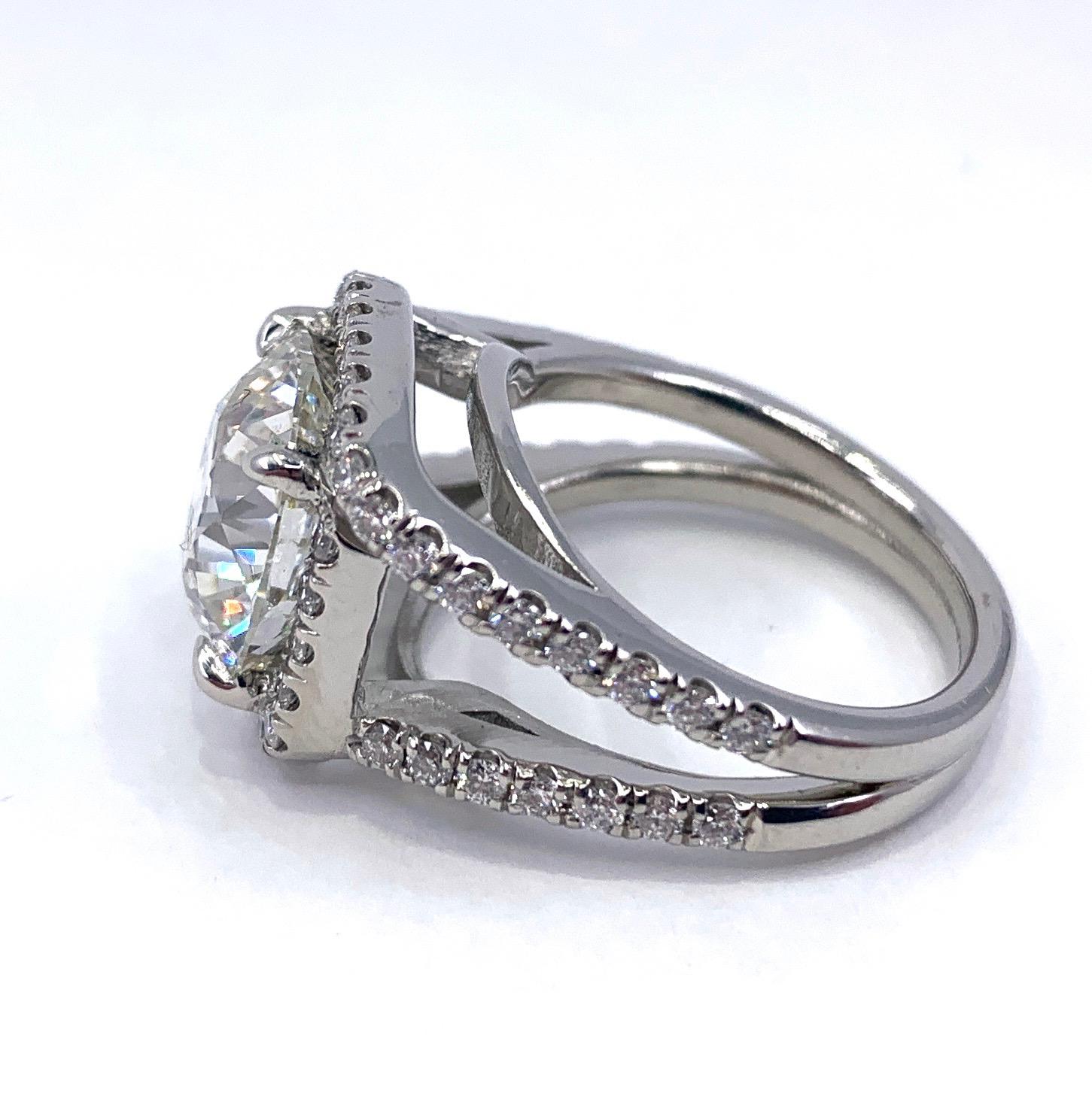 GIA Certified 6.44 Carat Cushion Cut Diamond in Updated Platinum Halo Ring In New Condition In Sherman Oaks, CA