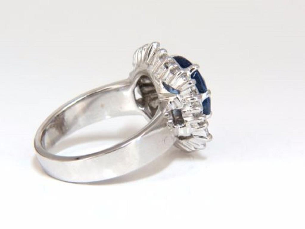 Classic Ballerina Cocktail

GIA Certified 

3.46ct. Natural Blue Sapphire ring.

Report:  5172627151

Cushion cut: 9.81 X 7.91 X 4.69mm

Transparent, Violetish Blue Color

No Heat & No Enhancements.


3.00ct. Side natural Baguette & Round