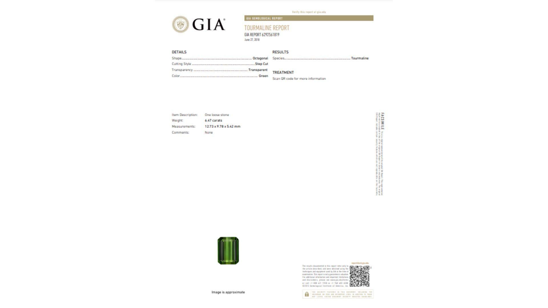 GIA Certified Green Tourmaline 18K White Gold Ring. 

18K white gold ring showcasing a 6.47 carat octagonal cut tourmaline. The tourmaline gemstone boasts a green hue.Securely set in a bezel setting, this exceptional piece highlights the natural