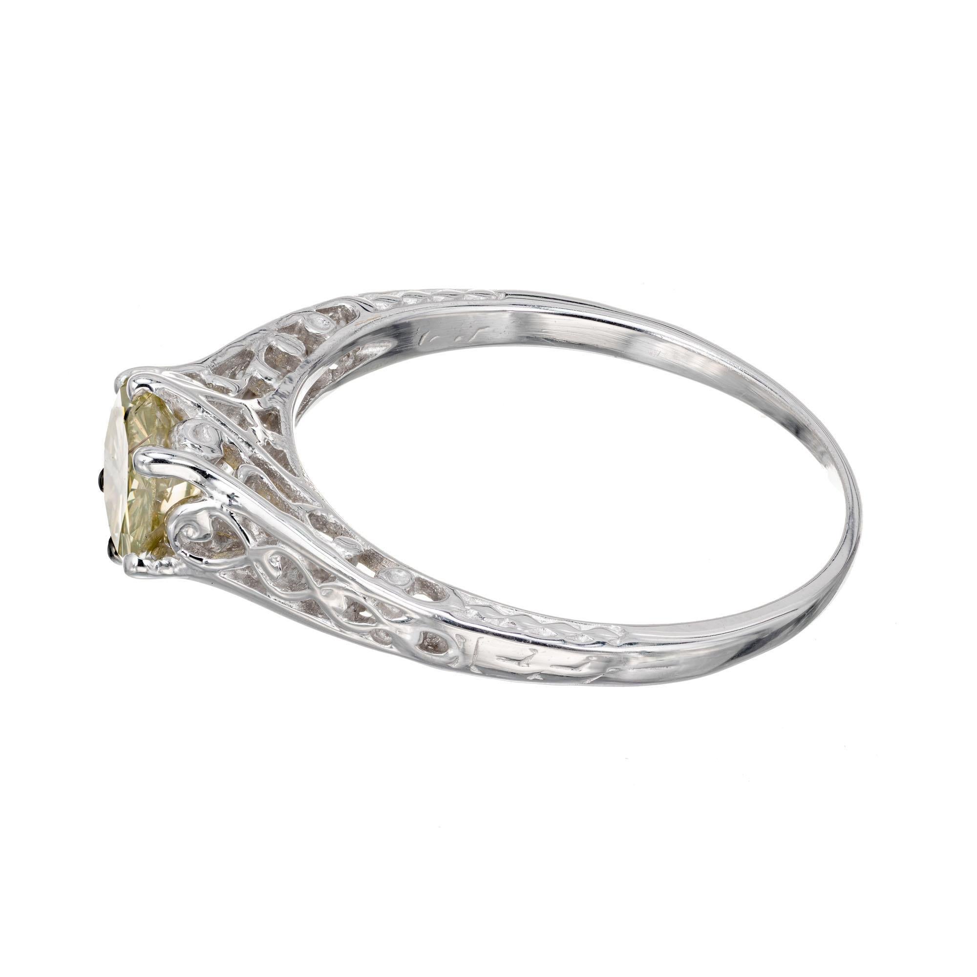 Round Cut GIA Certified .65 Carat Yellow Diamond White Gold Engagement Ring For Sale